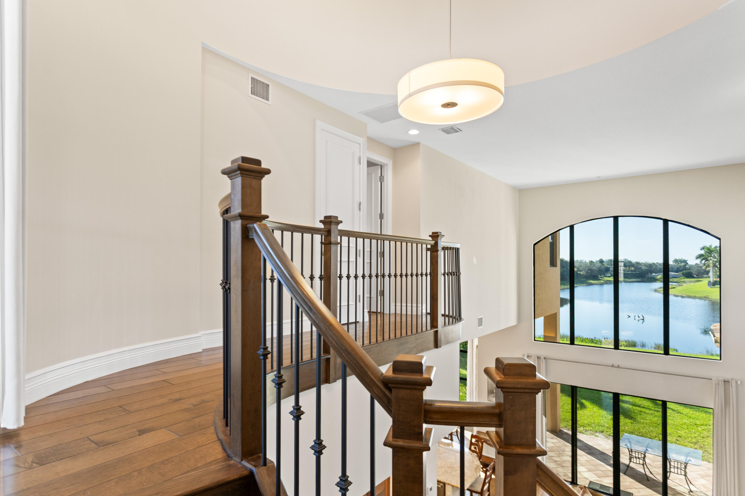 16743 Picardy Way Delray Beach, FL 33446 - Photo 33 of 79 a view of staircase with railing and white walls