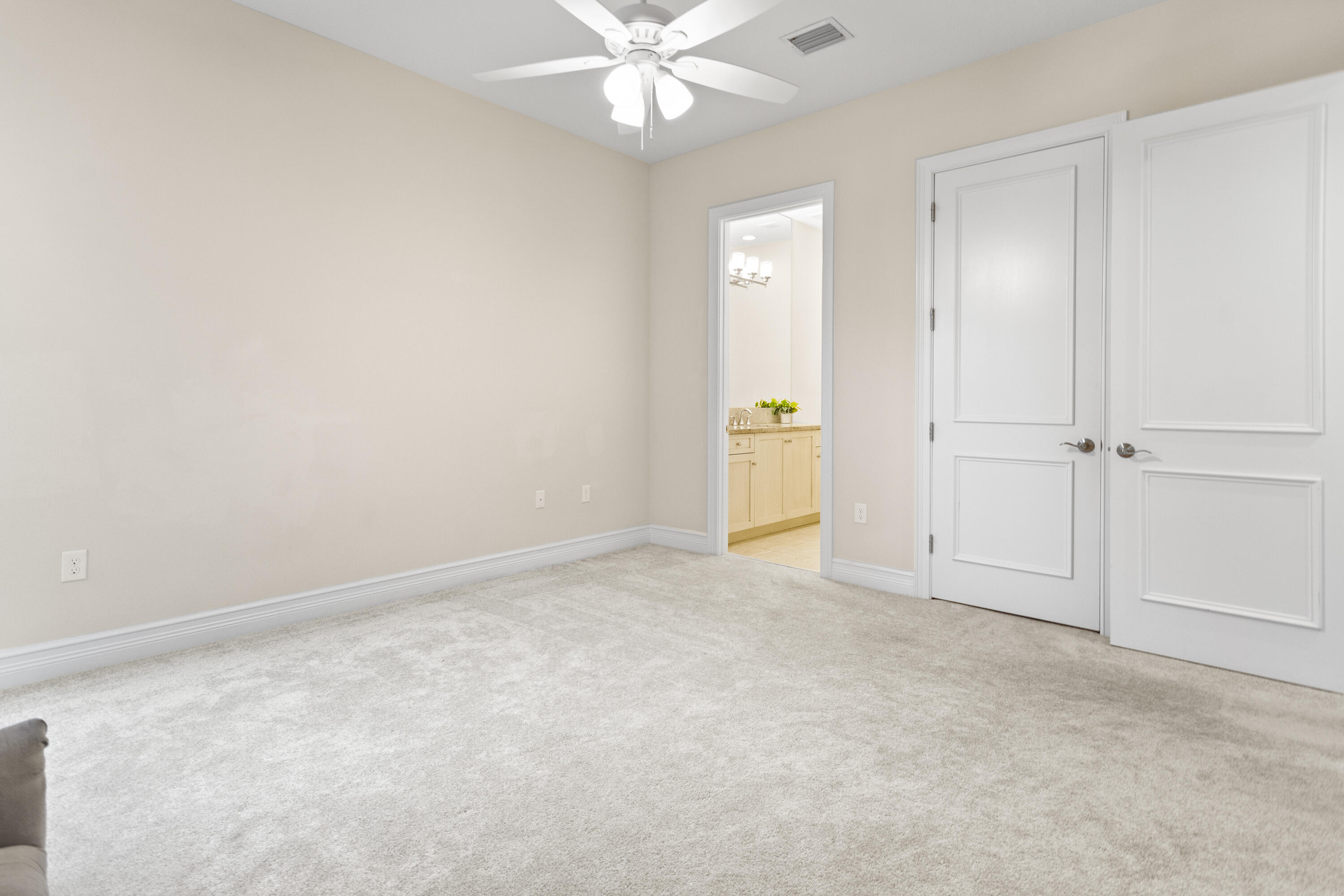 16743 Picardy Way Delray Beach, FL 33446 - Photo 47 of 79 an empty room with closet and fan