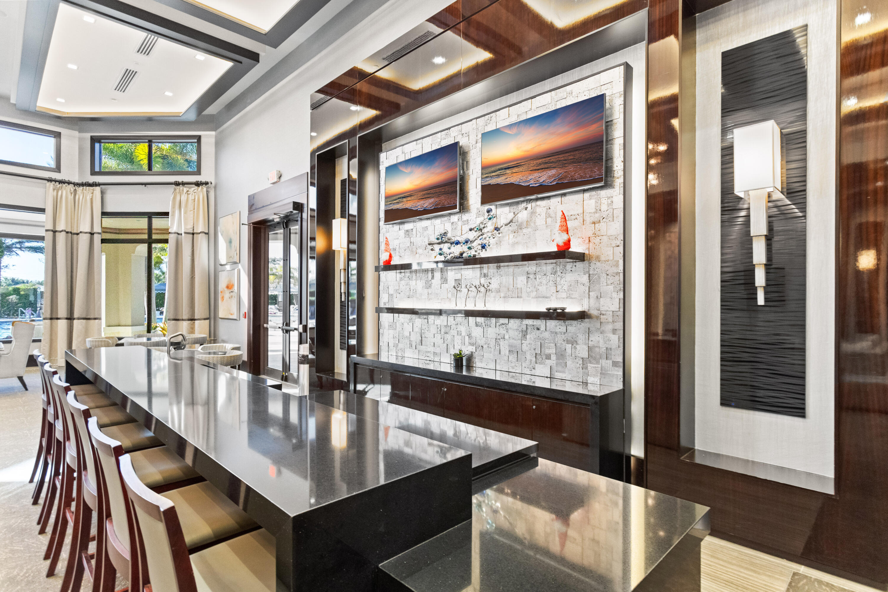 16743 Picardy Way Delray Beach, FL 33446 - Photo 59 of 79 a dining room with furniture and a floor to ceiling window