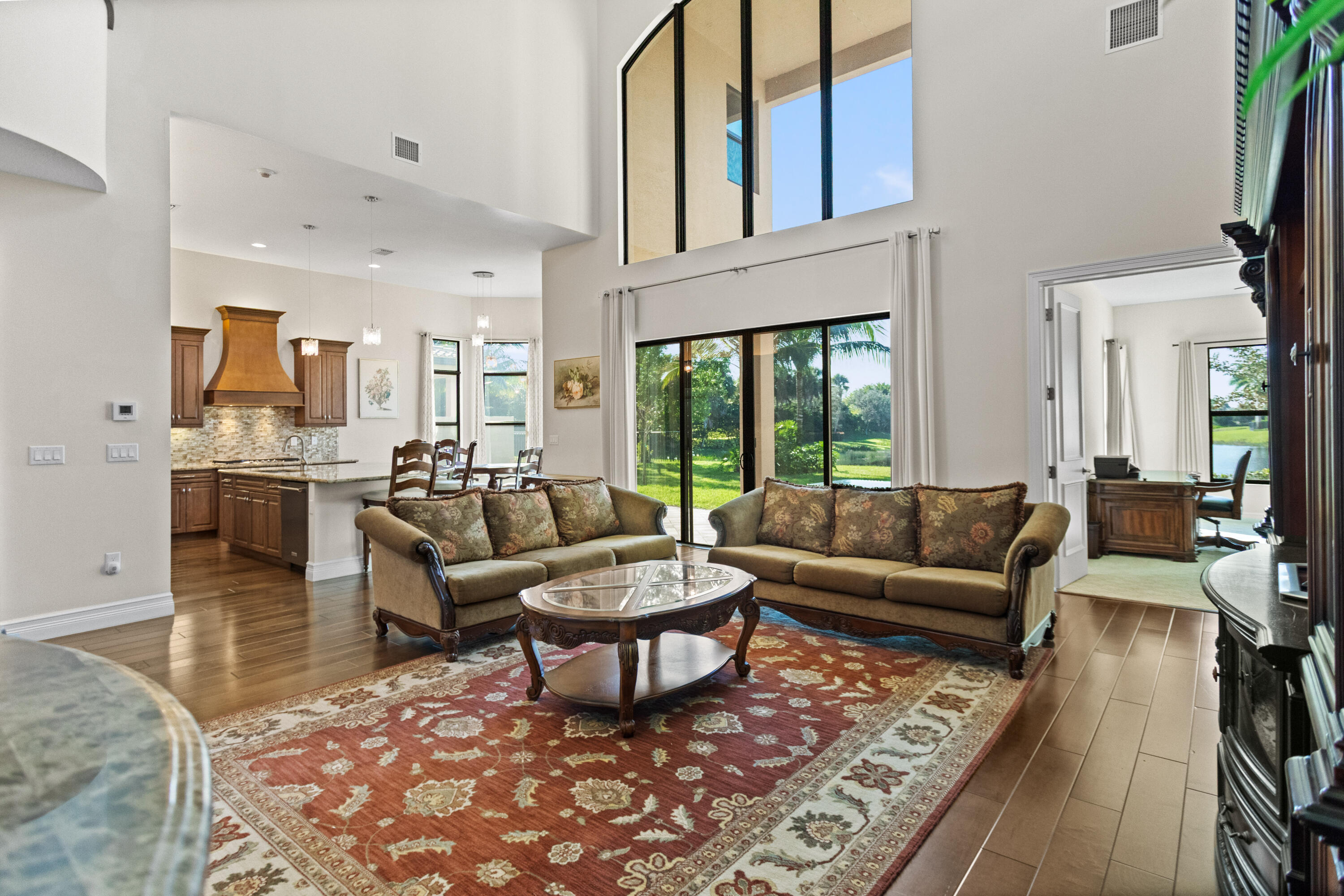 16743 Picardy Way Delray Beach, FL 33446 - Photo 9 of 79 a living room with furniture and a large window