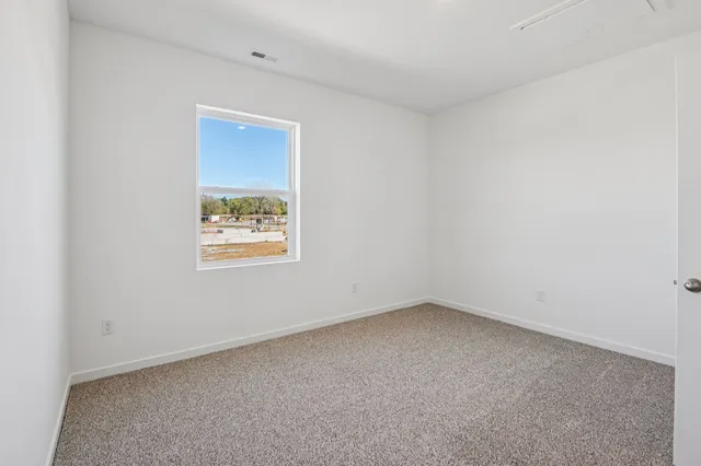 a view of a room with racks on the wall