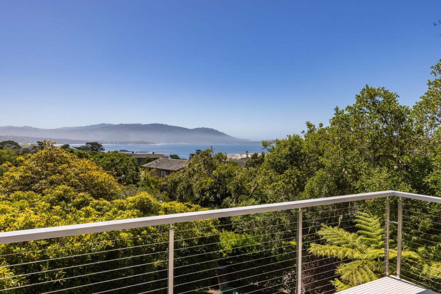 3307 17 Mile Drive, Unit 3 Pebble Beach, CA 93953 - Photo 26 of 42 a view of a balcony with an outdoor space