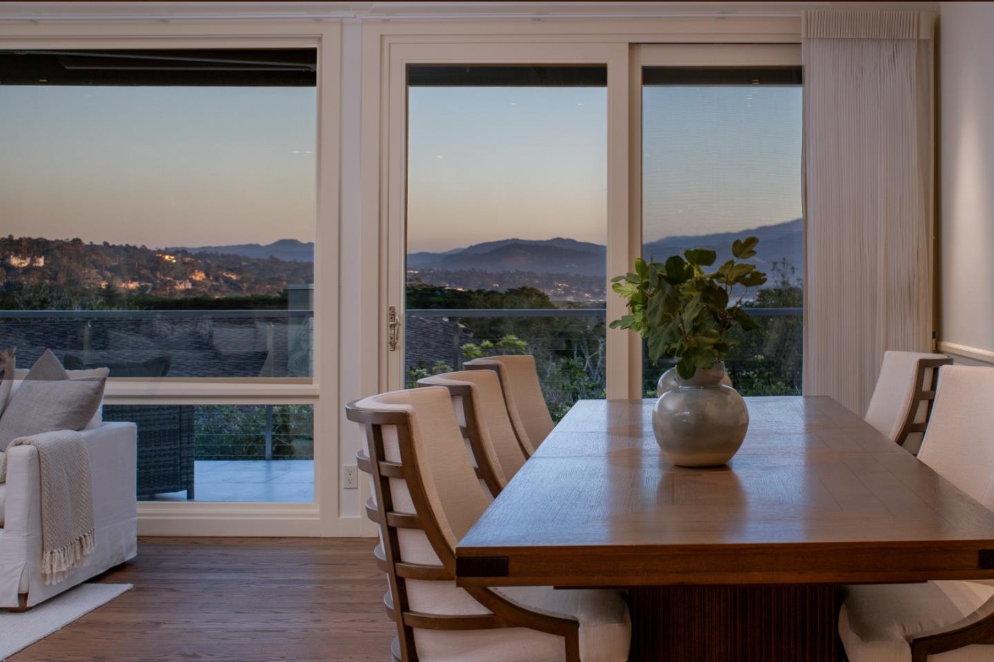 3307 17 Mile Drive, Unit 3 Pebble Beach, CA 93953 - Photo 38 of 42 a view of a dining room with furniture window and wooden floor