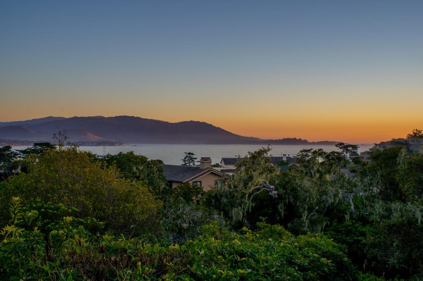 3307 17 Mile Drive, Unit 3 Pebble Beach, CA 93953 - Photo 4 of 42 a view of a large mountains in a field