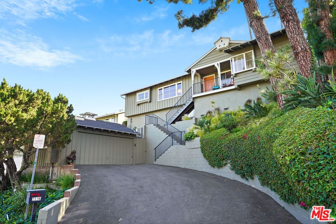 front view of a house with a street