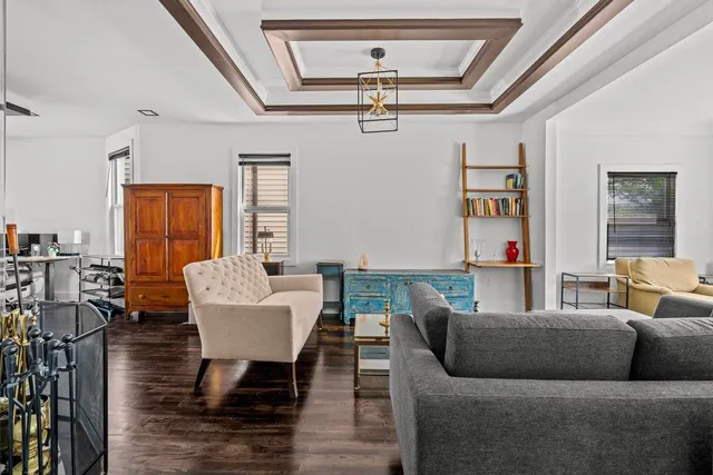 a picture of a room with a white wall and a picture