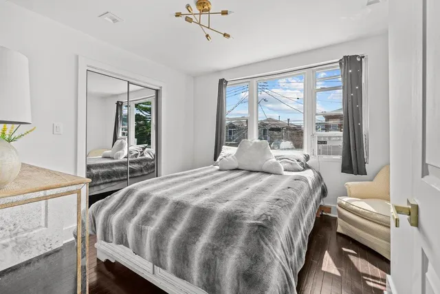 a bathroom with a toilet sink and shower