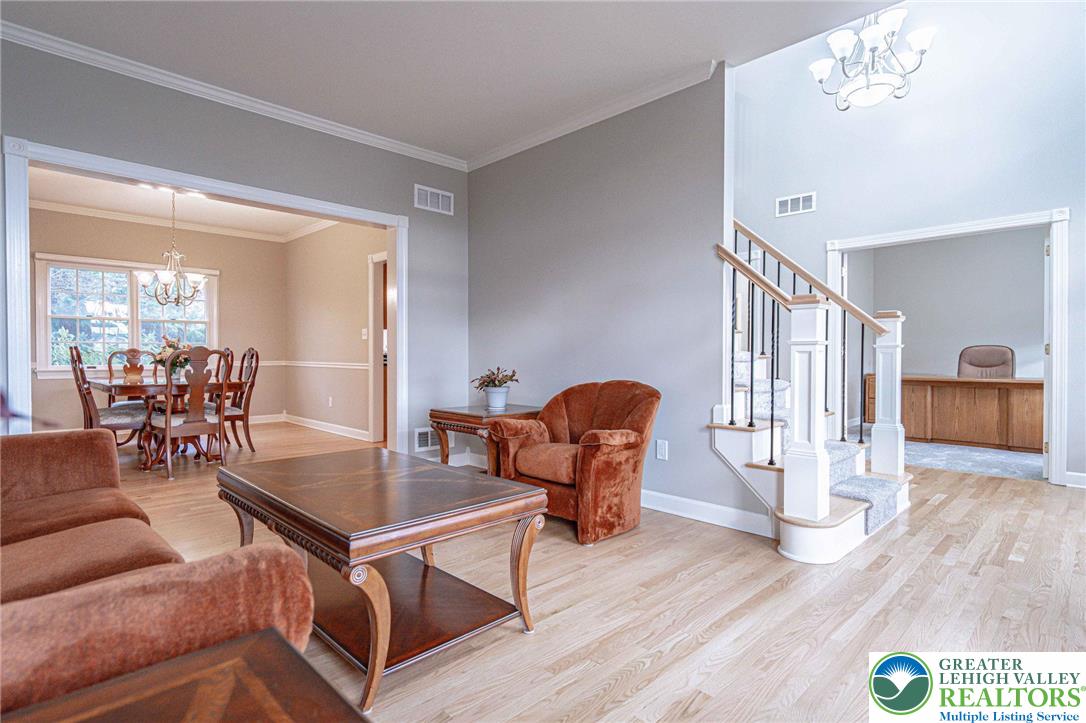 6551 Overlook Road Orefield, PA 18069 - Photo 16 of 82 a living room with furniture and wooden floor
