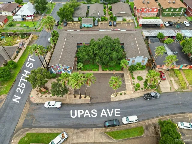a street sign that is on a wooden wall