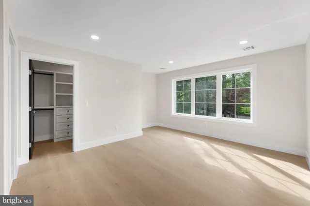 a kitchen with granite countertop a sink and a window