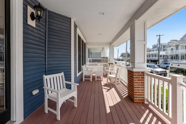 a view of a balcony with chairs