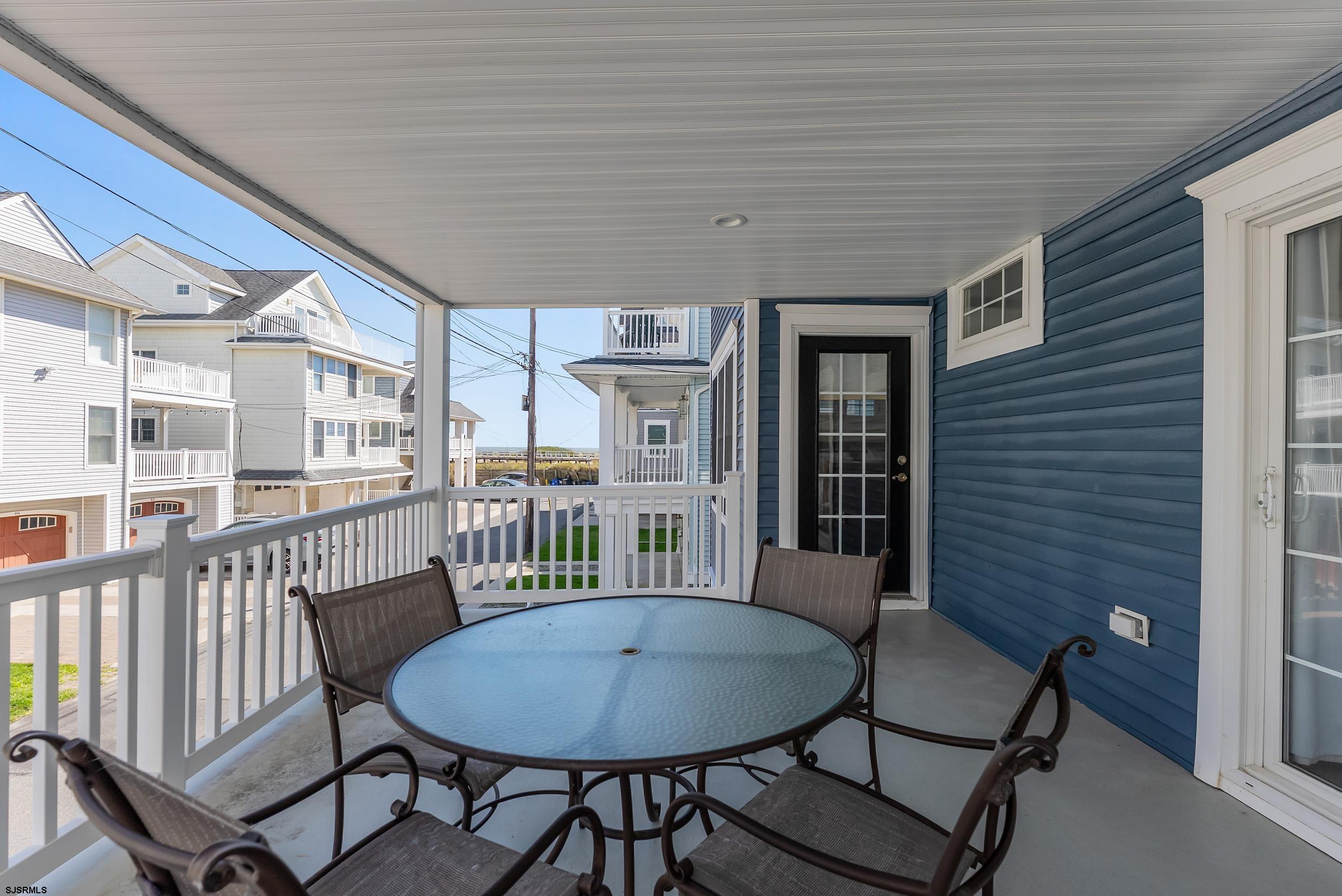 909 East 4th Street, Unit 1 Ocean City, NJ 08226 - Photo 37 of 47 a view of a dining room with furniture and window