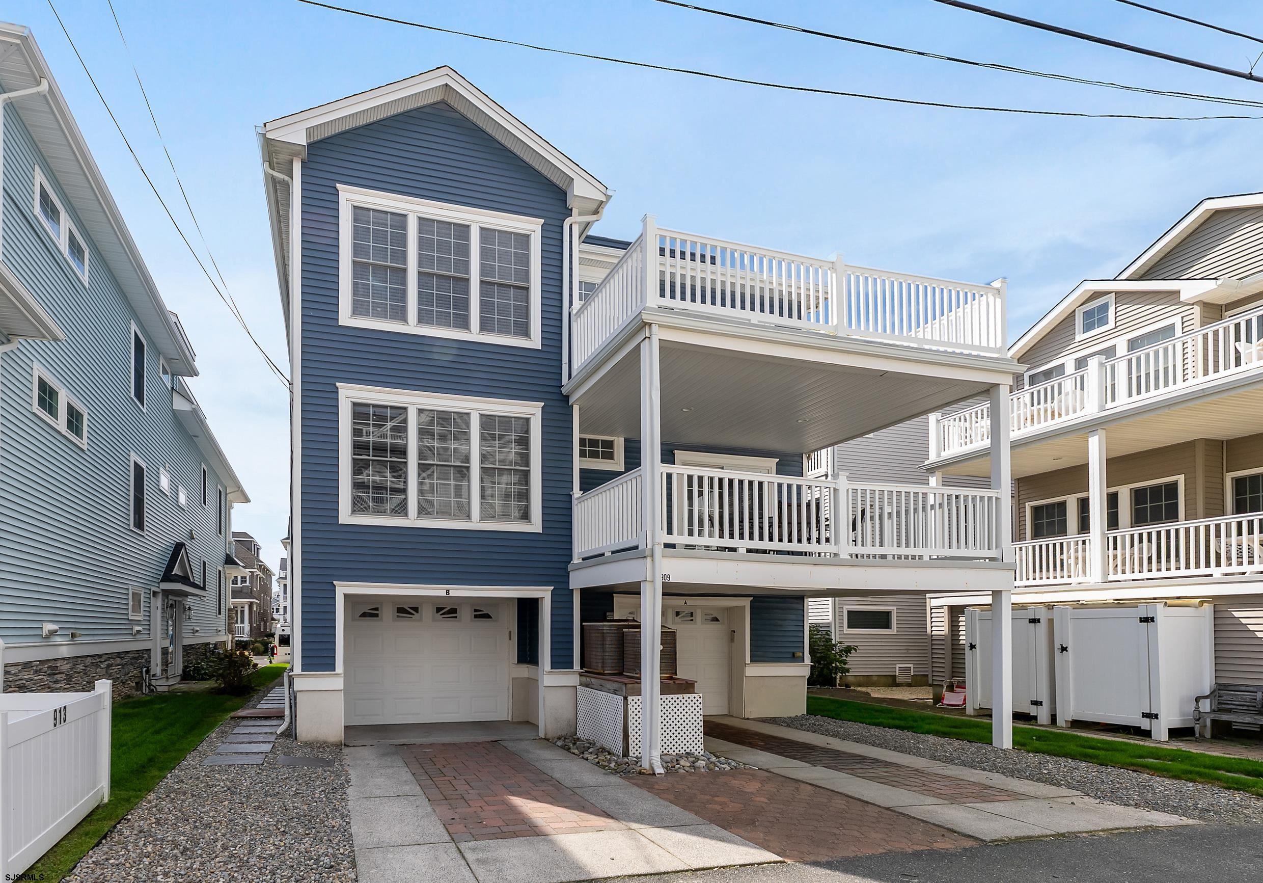 909 East 4th Street, Unit 1 Ocean City, NJ 08226 - Photo 40 of 47 a view of a building with a outdoor space