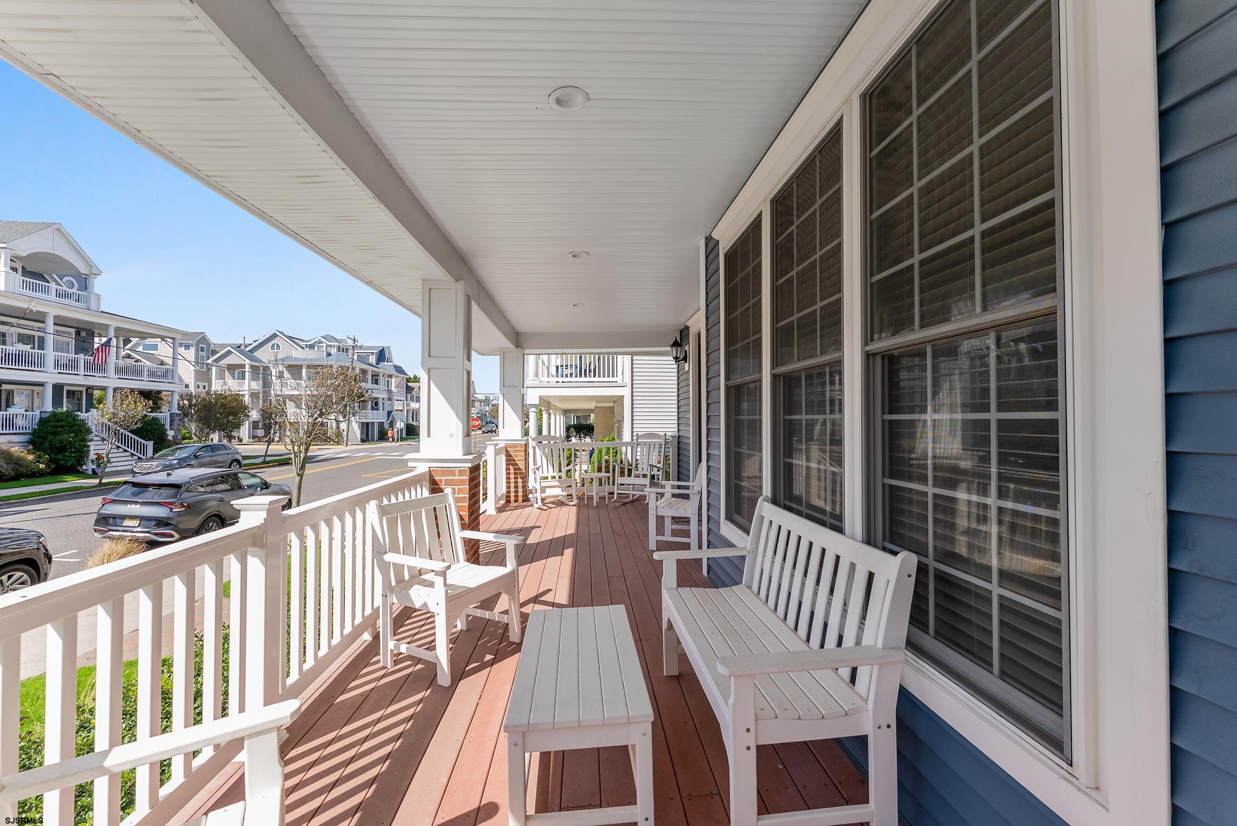 909 East 4th Street, Unit 1 Ocean City, NJ 08226 - Photo 4 of 47 a view of a balcony with chairs