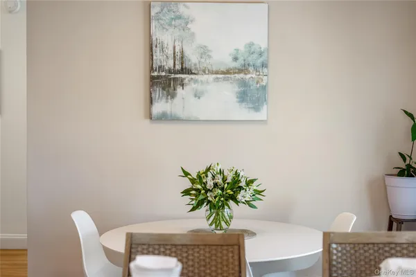 a vase of flowers sitting on a table