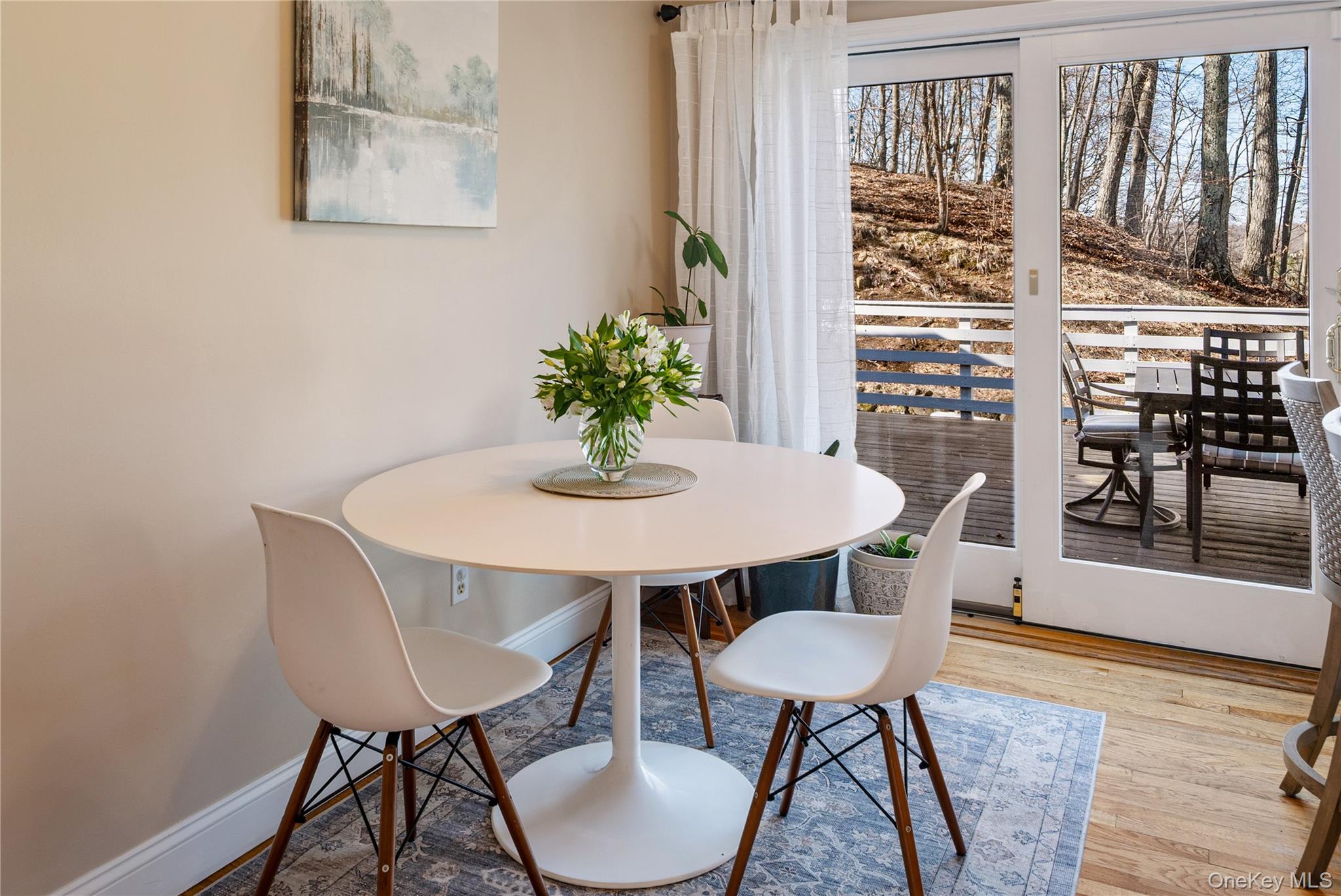 15 Cross Road Cortlandt Manor, NY 10567 - Photo 20 of 50 a view of a dining room with furniture and wooden floor