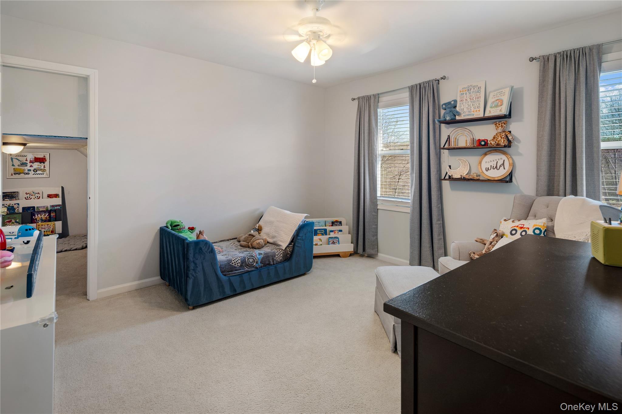15 Cross Road Cortlandt Manor, NY 10567 - Photo 30 of 50 a living room with furniture and a table