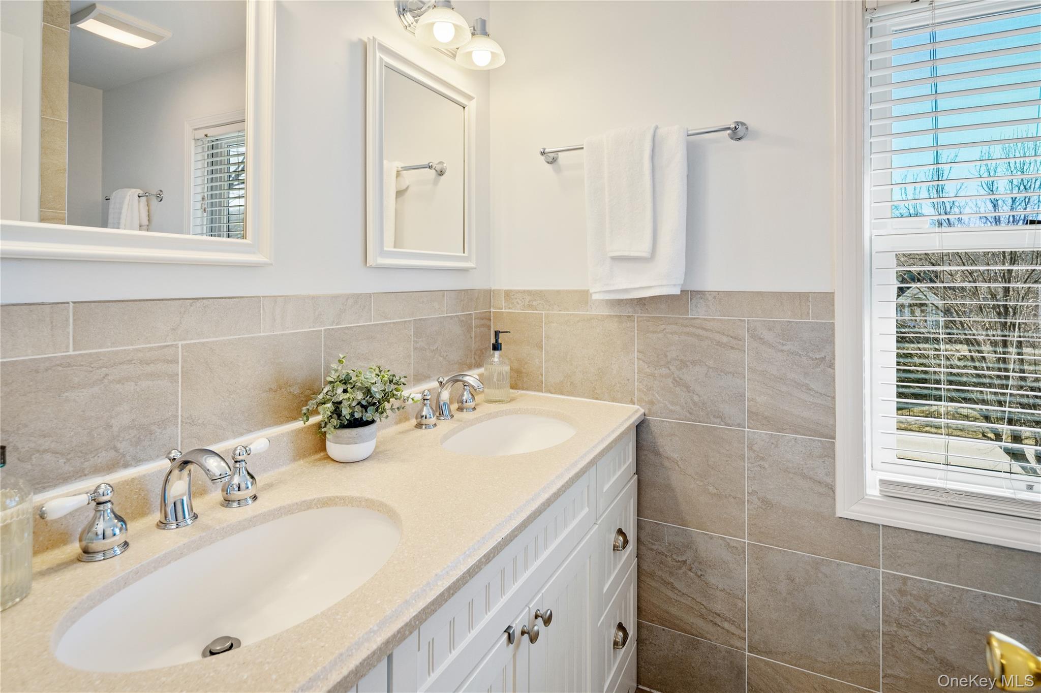 15 Cross Road Cortlandt Manor, NY 10567 - Photo 32 of 50 a bathroom with a sink and a mirror