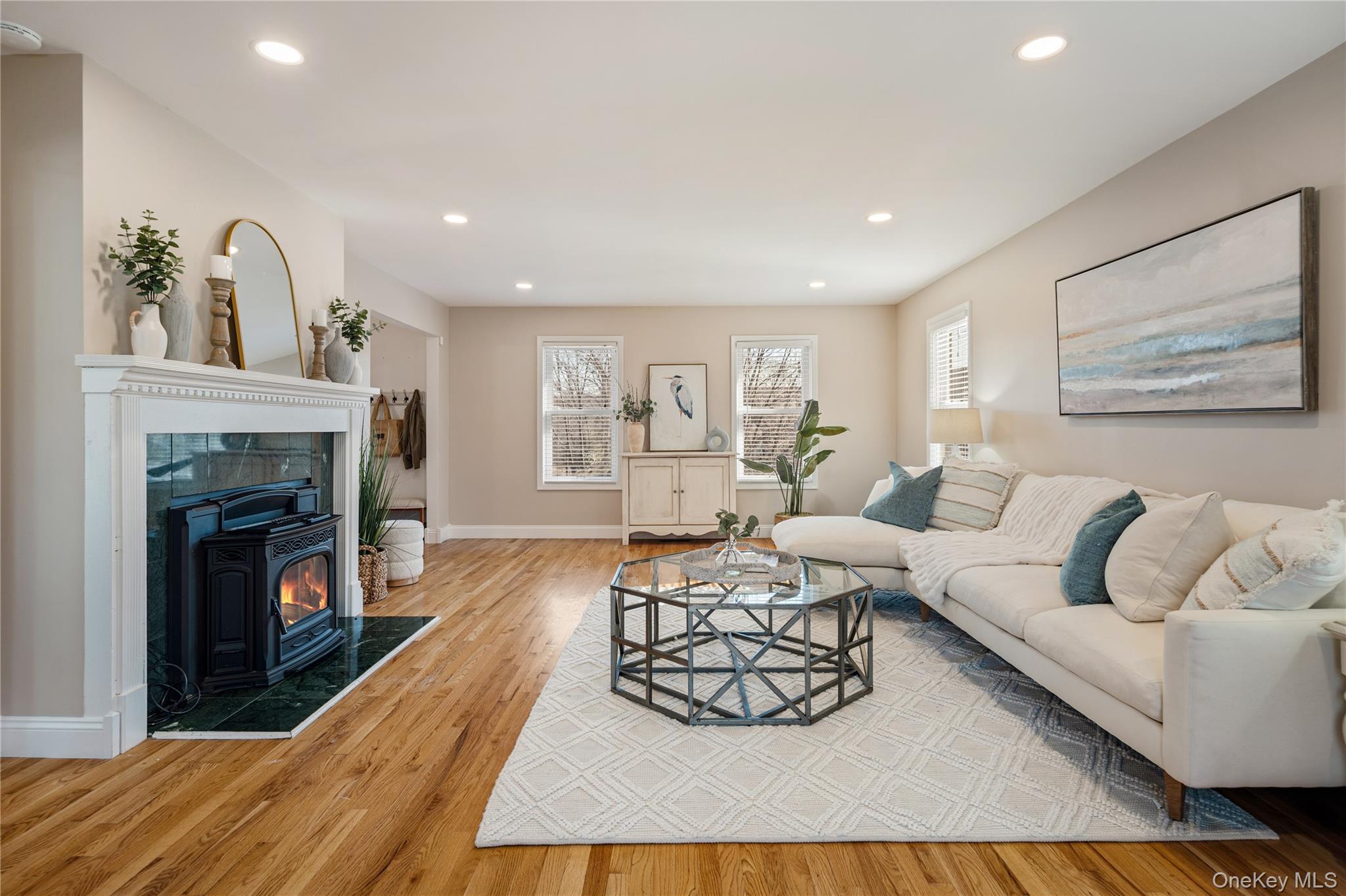 15 Cross Road Cortlandt Manor, NY 10567 - Photo 4 of 50 a living room with furniture and a fireplace