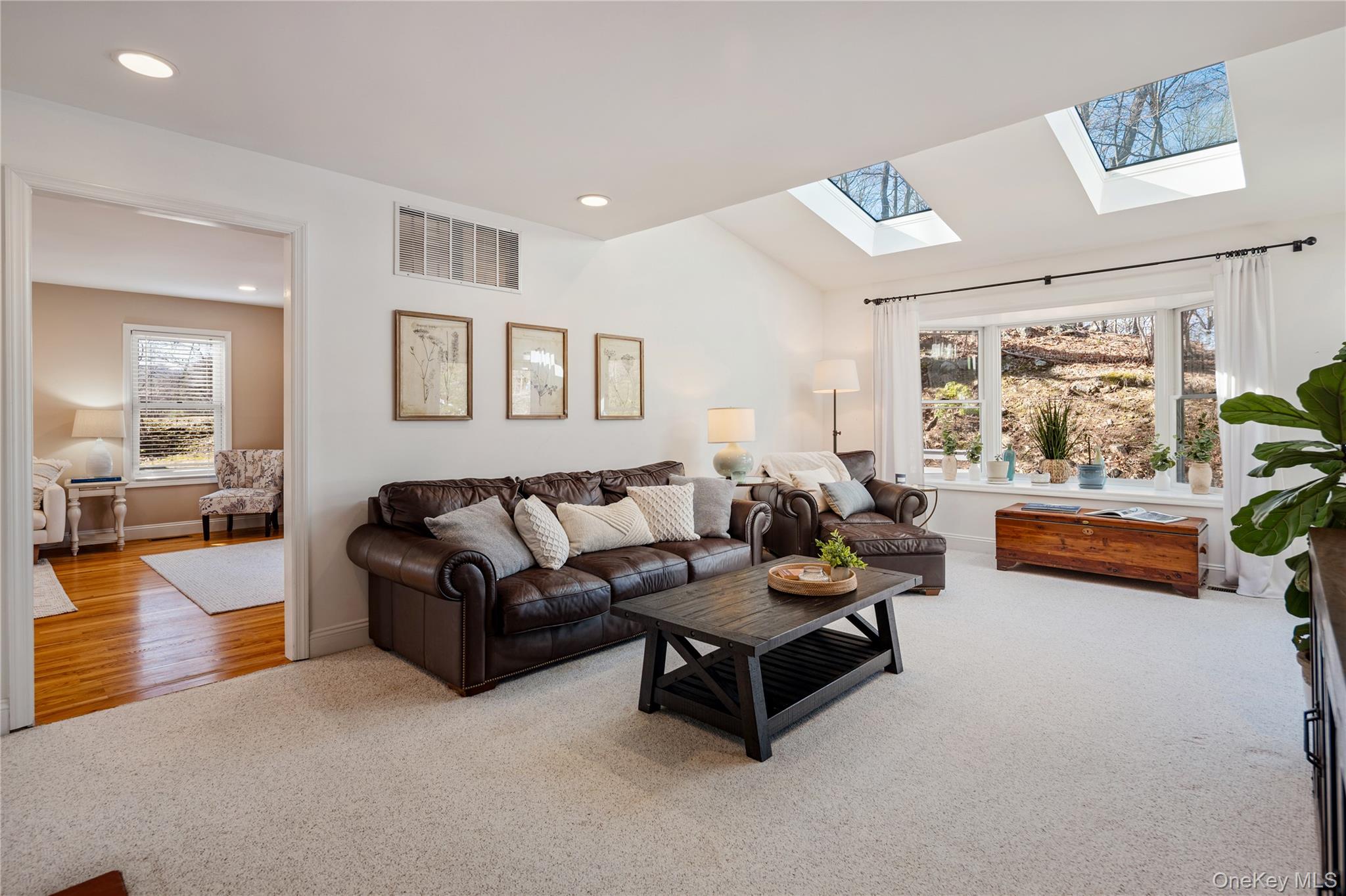 15 Cross Road Cortlandt Manor, NY 10567 - Photo 8 of 50 a living room with furniture and a large window