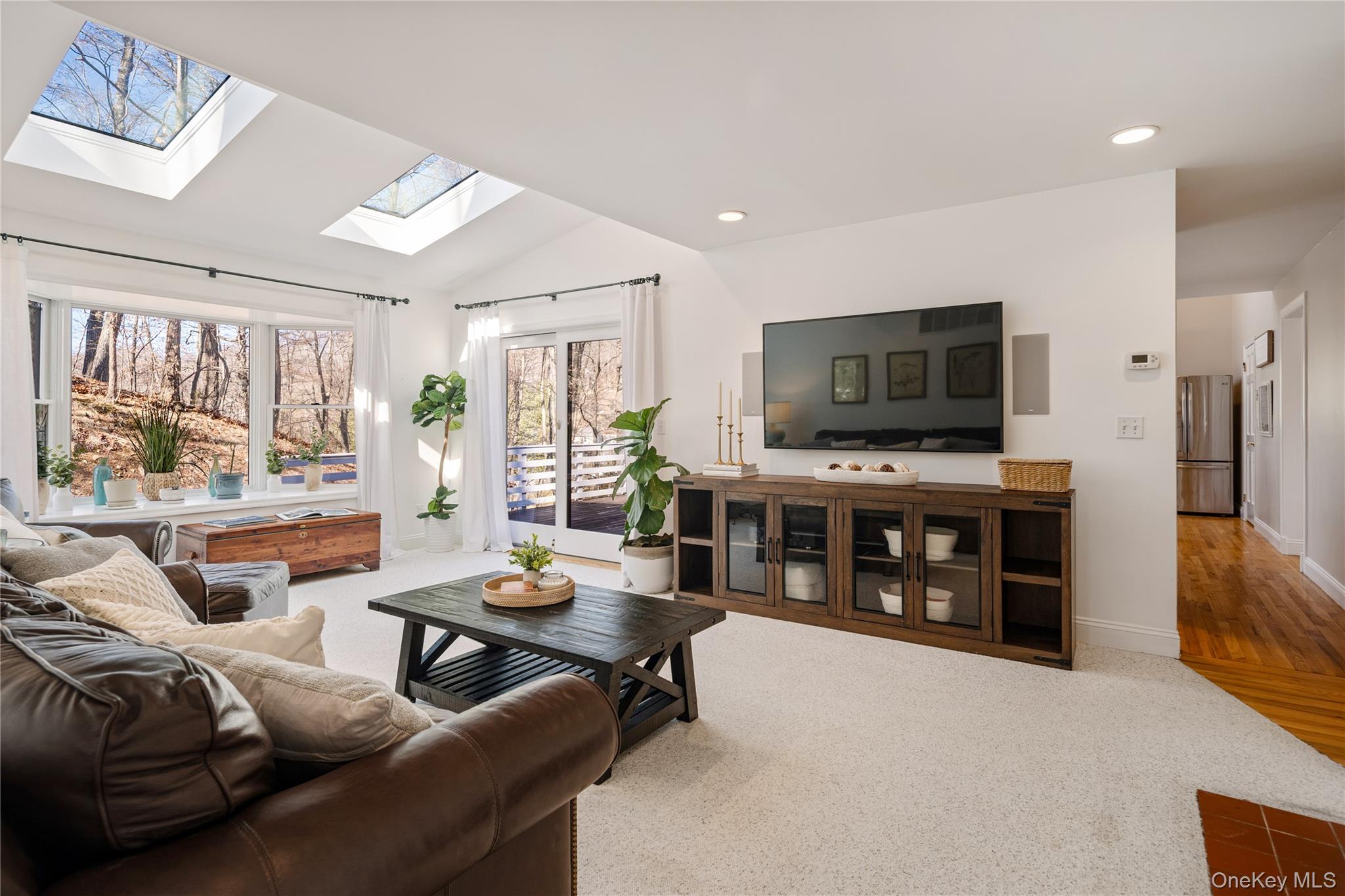 15 Cross Road Cortlandt Manor, NY 10567 - Photo 9 of 50 a living room with furniture and a flat screen tv