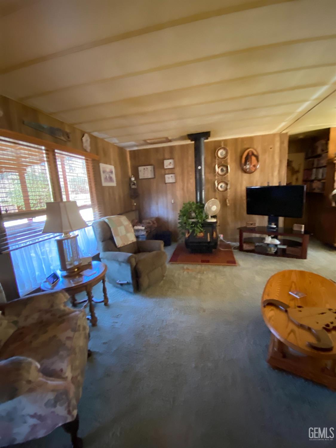 Undisclosed Address Caliente, CA 93518 - Photo 15 of 19 a living room with furniture and a flat screen tv