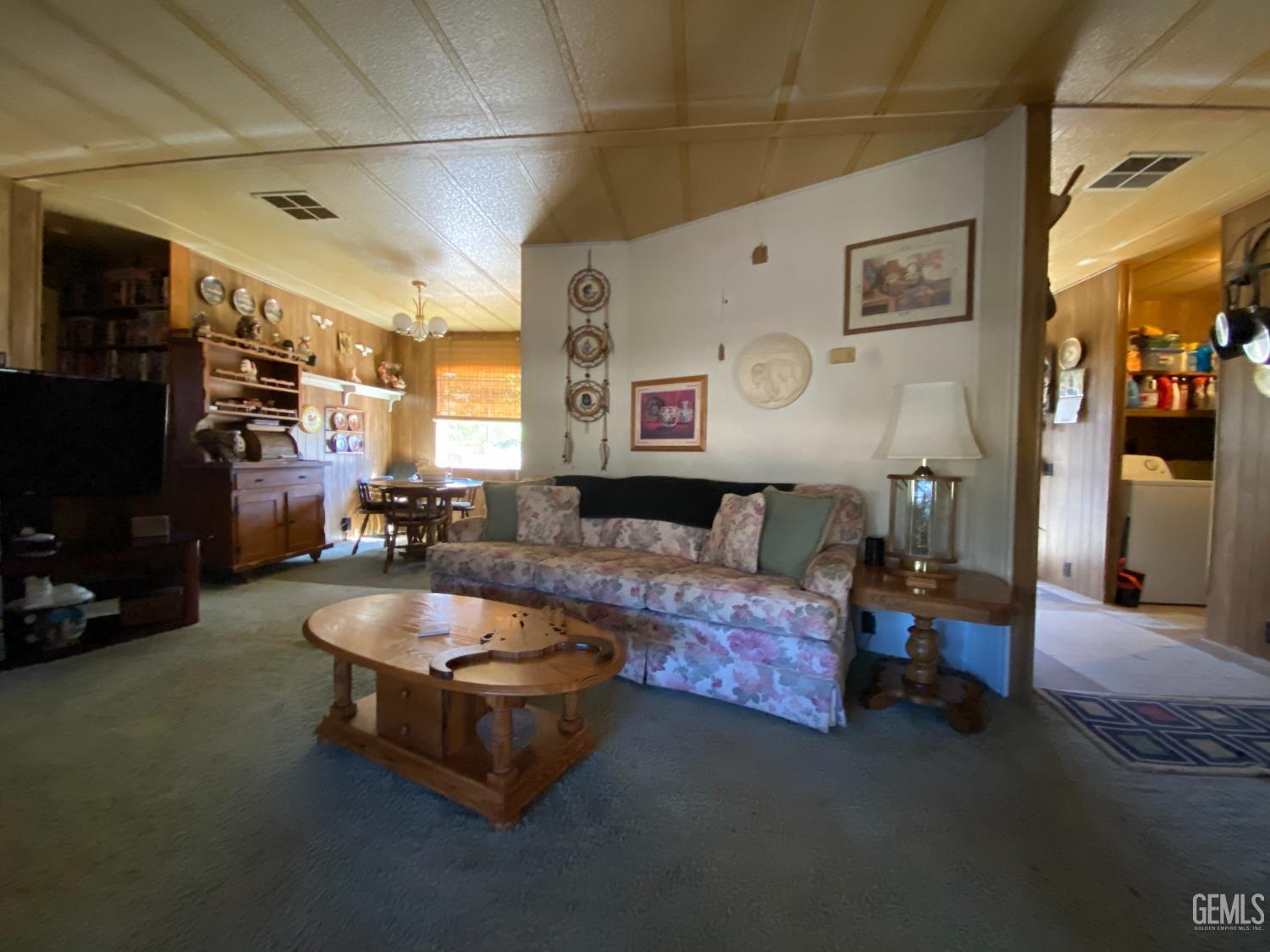 Undisclosed Address Caliente, CA 93518 - Photo 19 of 19 a living room with furniture and a flat screen tv