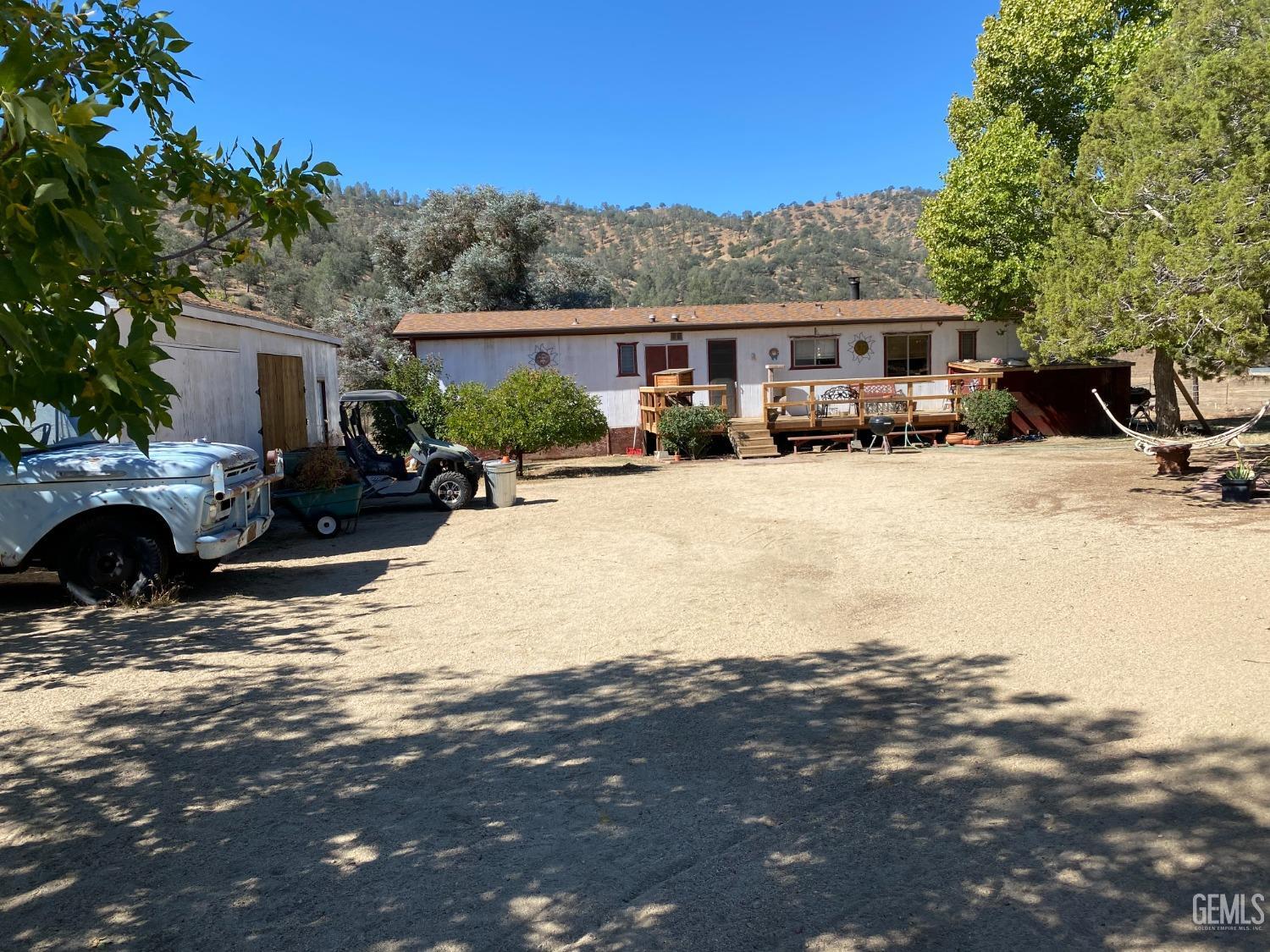 Undisclosed Address Caliente, CA 93518 - Photo 5 of 19 a view of a house with snow on the side of the road