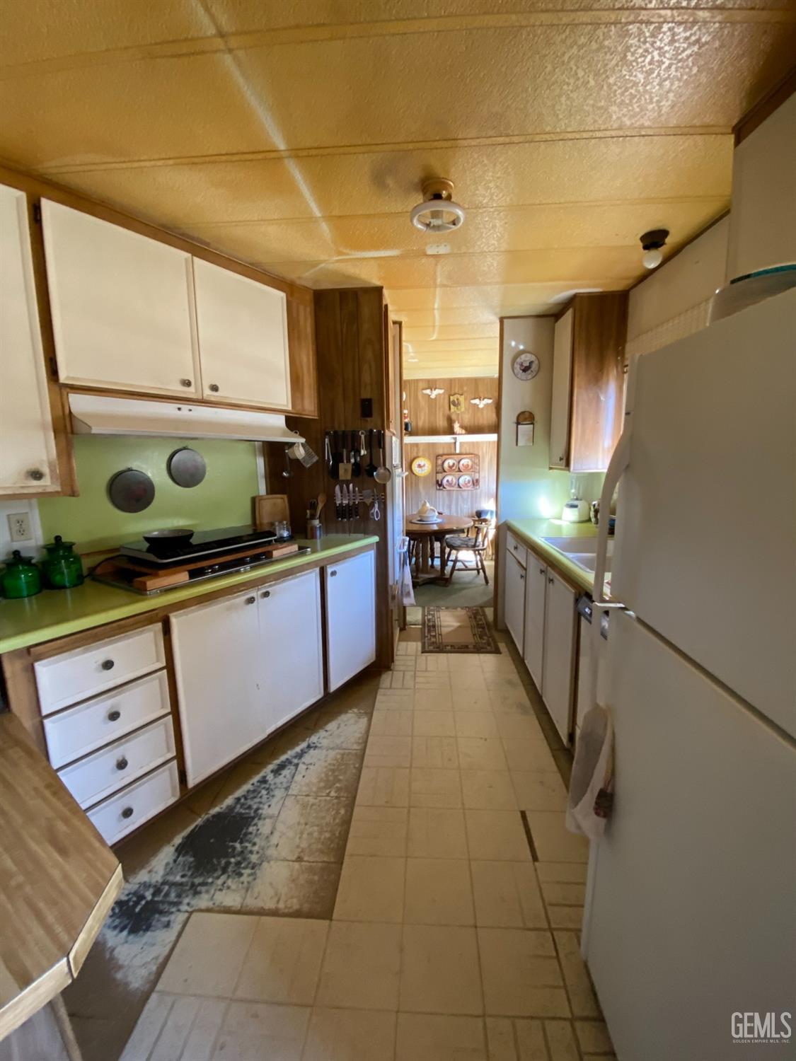 Undisclosed Address Caliente, CA 93518 - Photo 7 of 19 a kitchen with stainless steel appliances granite countertop a sink and cabinets