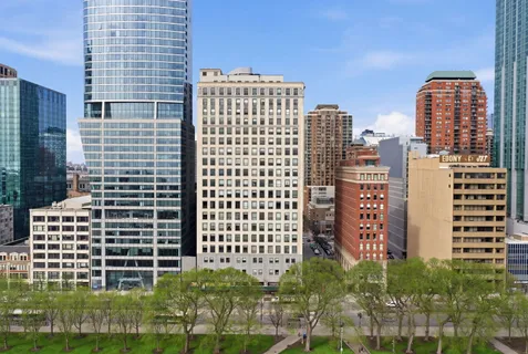 a view of a city with tall buildings