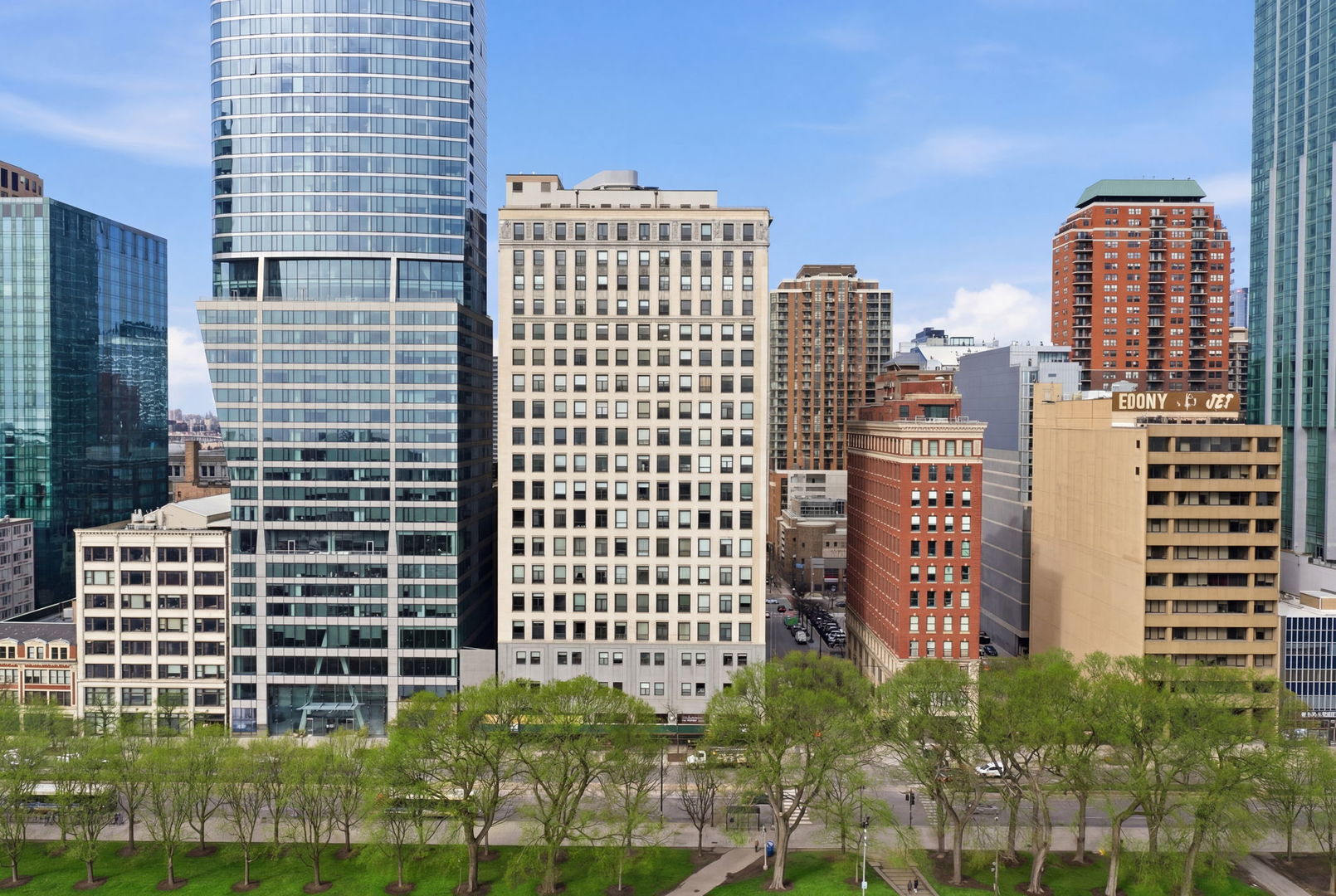 a view of a city with tall buildings