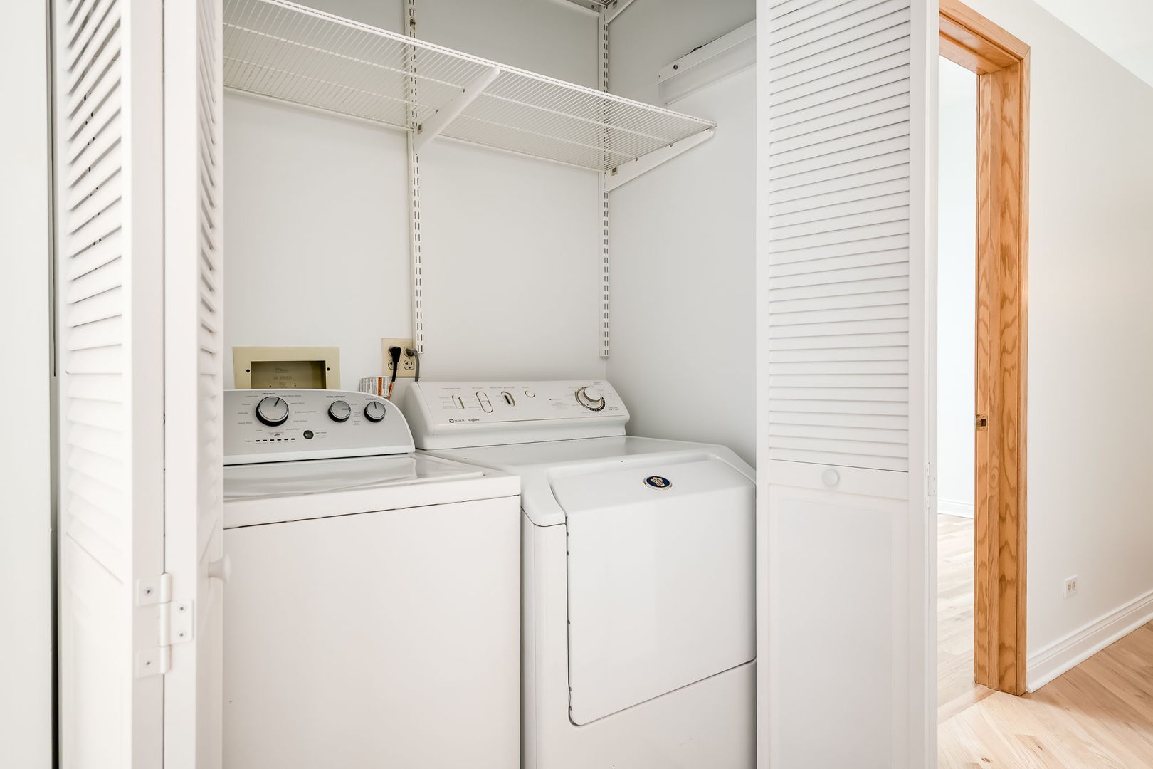910 South Michigan Avenue, Unit 1908 Chicago, IL 60605 - Photo 19 of 29 a utility room with dryer and washer