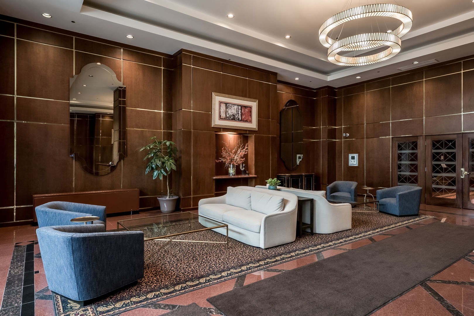 910 South Michigan Avenue, Unit 1908 Chicago, IL 60605 - Photo 23 of 29 a living room with furniture a lamp and a potted plant