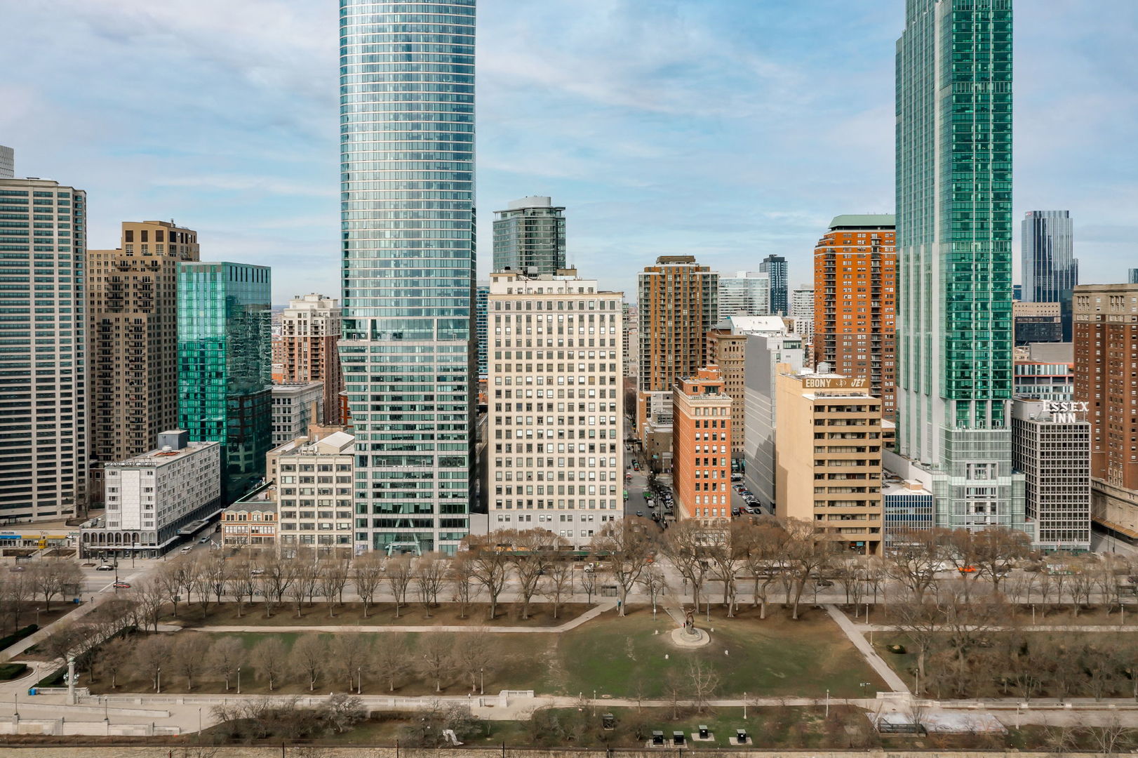 910 South Michigan Avenue, Unit 1908 Chicago, IL 60605 - Photo 29 of 29 a front view of a residential apartment building with a yard
