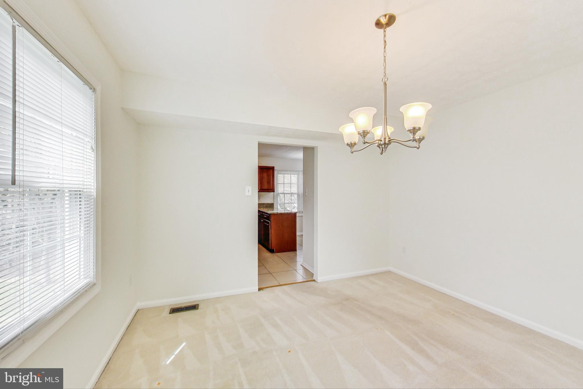 11718 Whittier Road Bowie, MD 20721 - Photo 12 of 70 Formal Dining Room -Kitchen Access