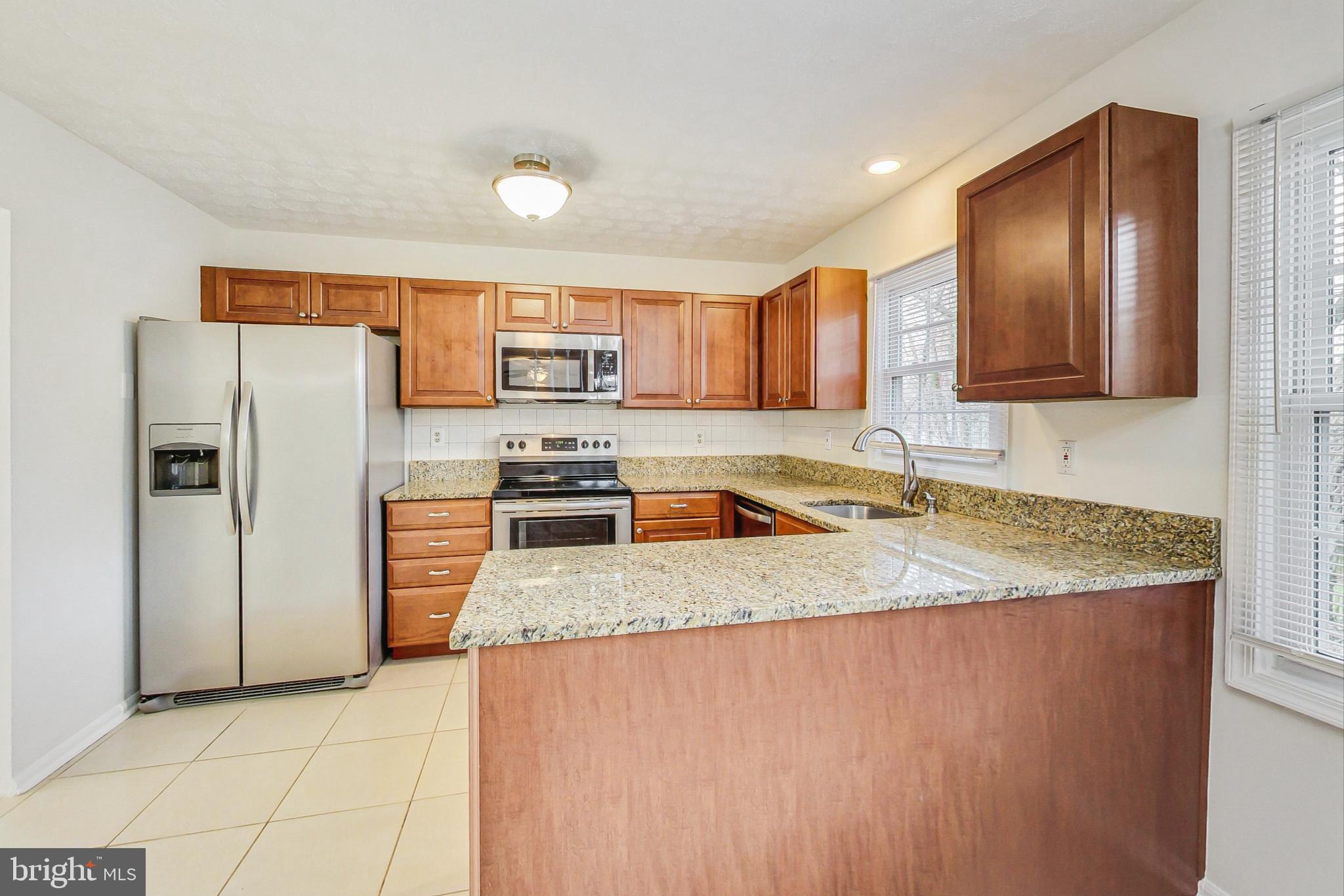 11718 Whittier Road Bowie, MD 20721 - Photo 16 of 70 Kitchen - Granite Countertops