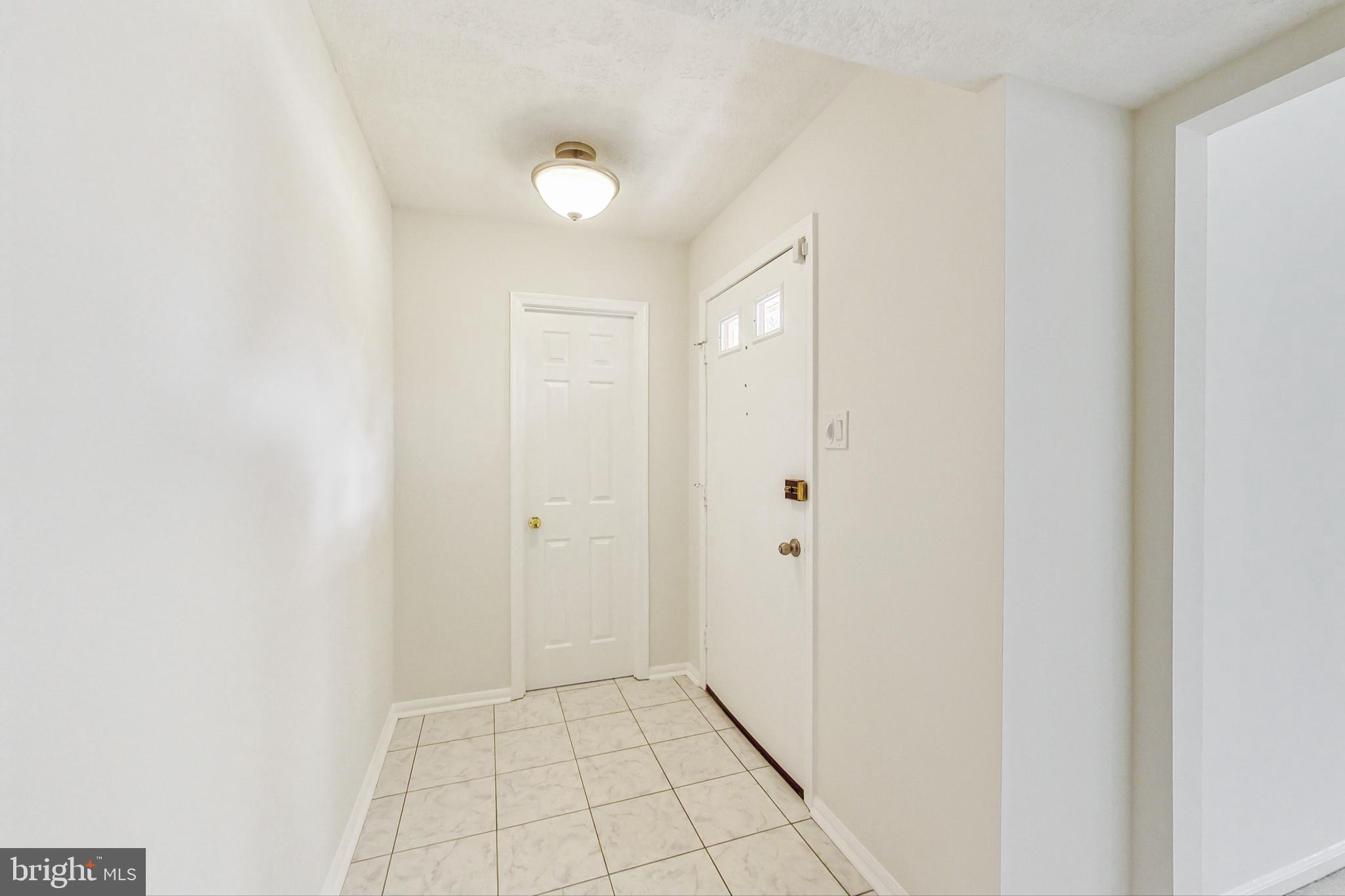 11718 Whittier Road Bowie, MD 20721 - Photo 5 of 70 Foyer, Front Door, Coat Closet Access