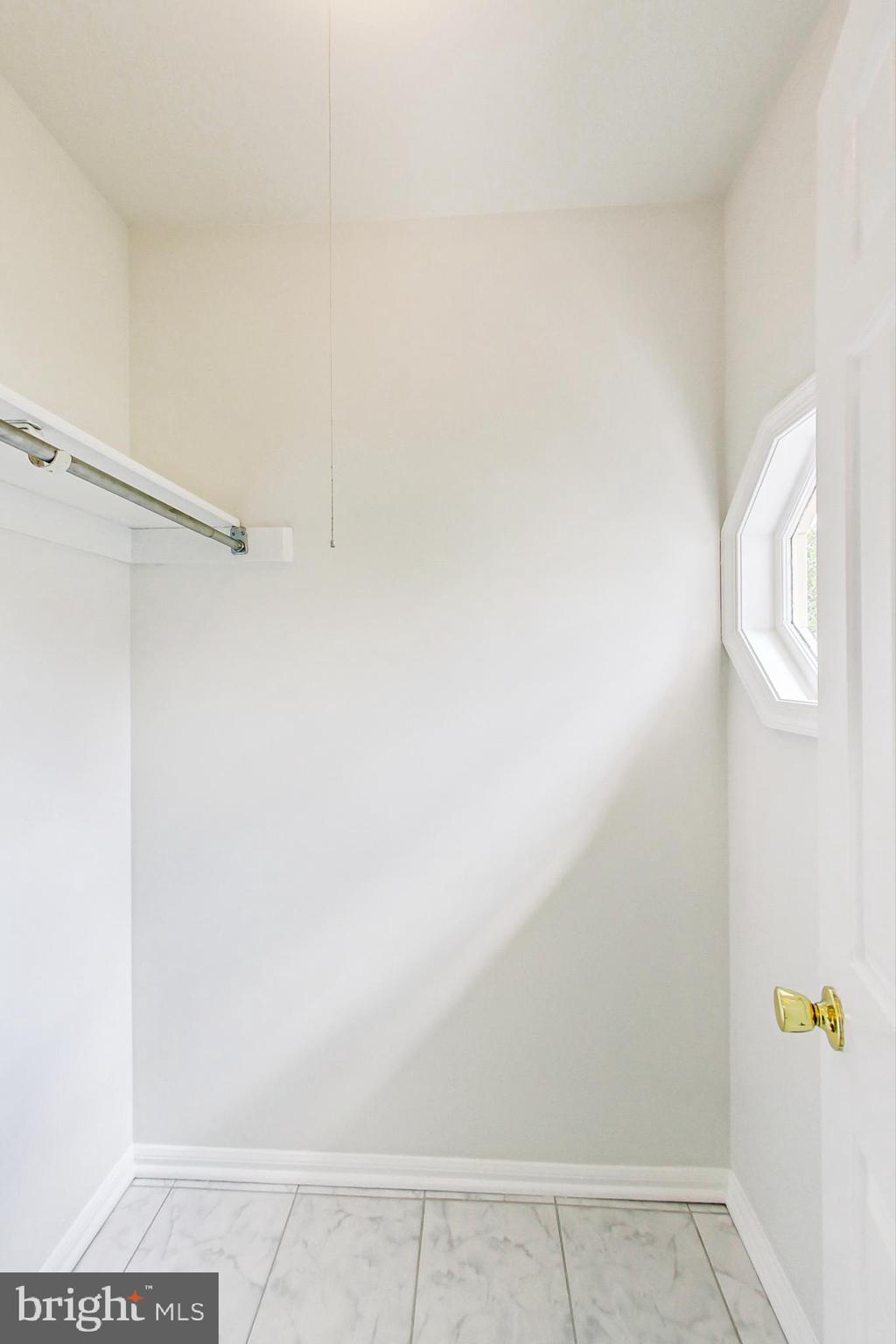 11718 Whittier Road Bowie, MD 20721 - Photo 6 of 70 Walk-in Coat Closet with Hexagonal Window