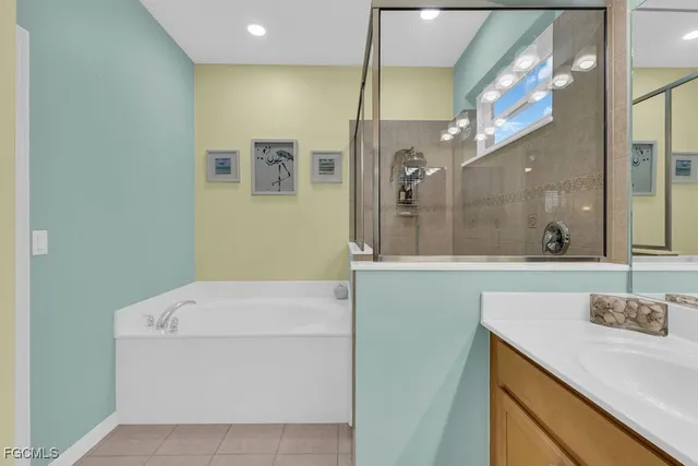 a view of a patio with a table and chairs and potted plants