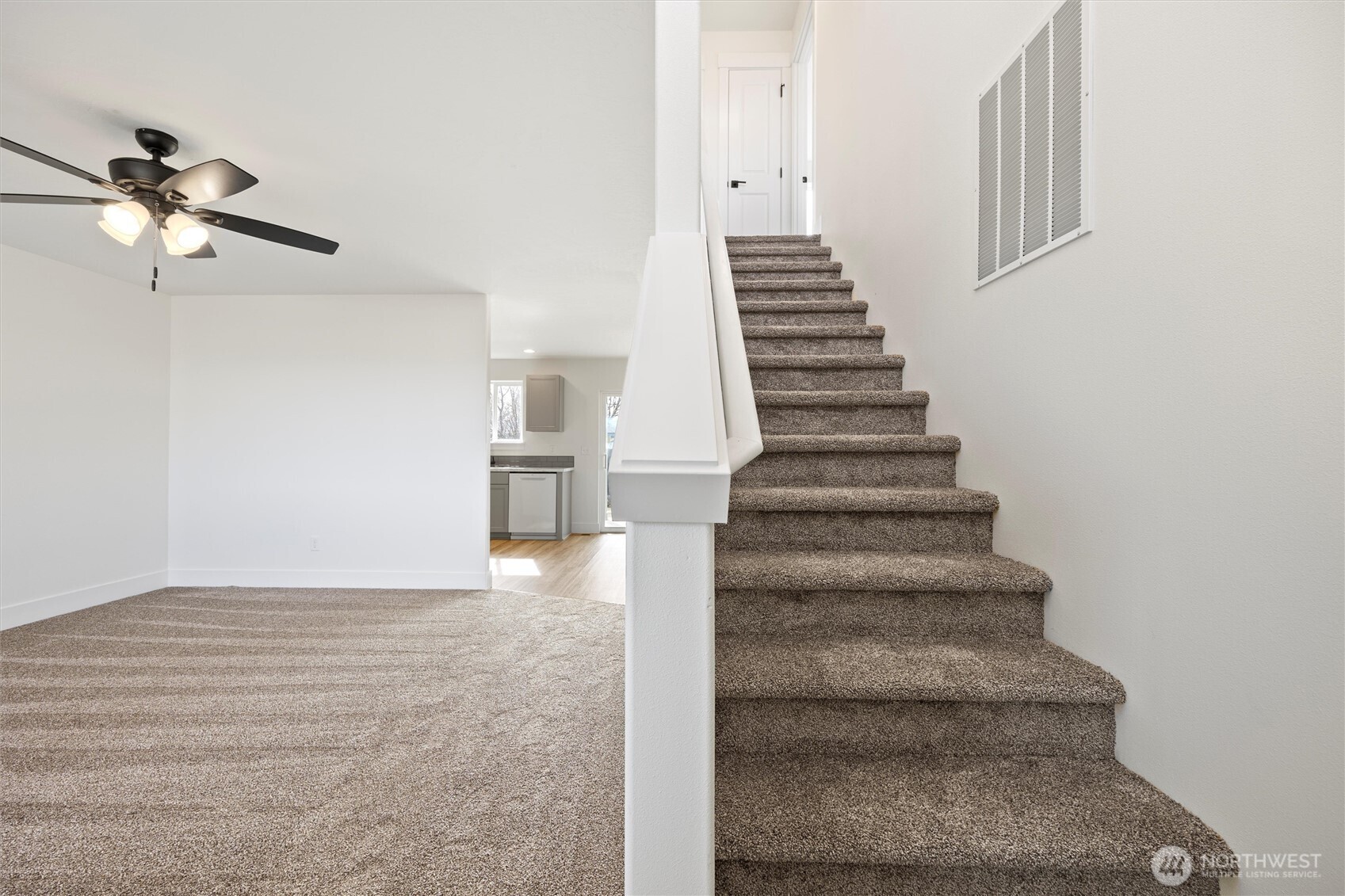 653 East Franklin Street Connell, WA 99326 - Photo 2 of 26 a view of entryway and hall with wooden floor