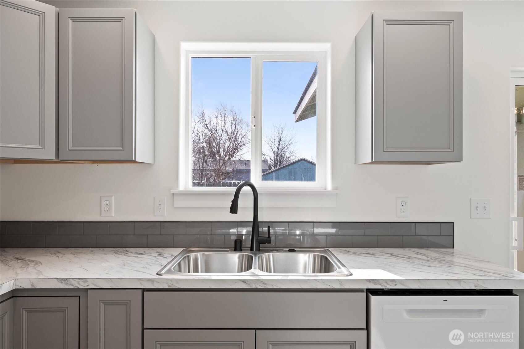 653 East Franklin Street Connell, WA 99326 - Photo 9 of 26 a close view of sink and cabinets