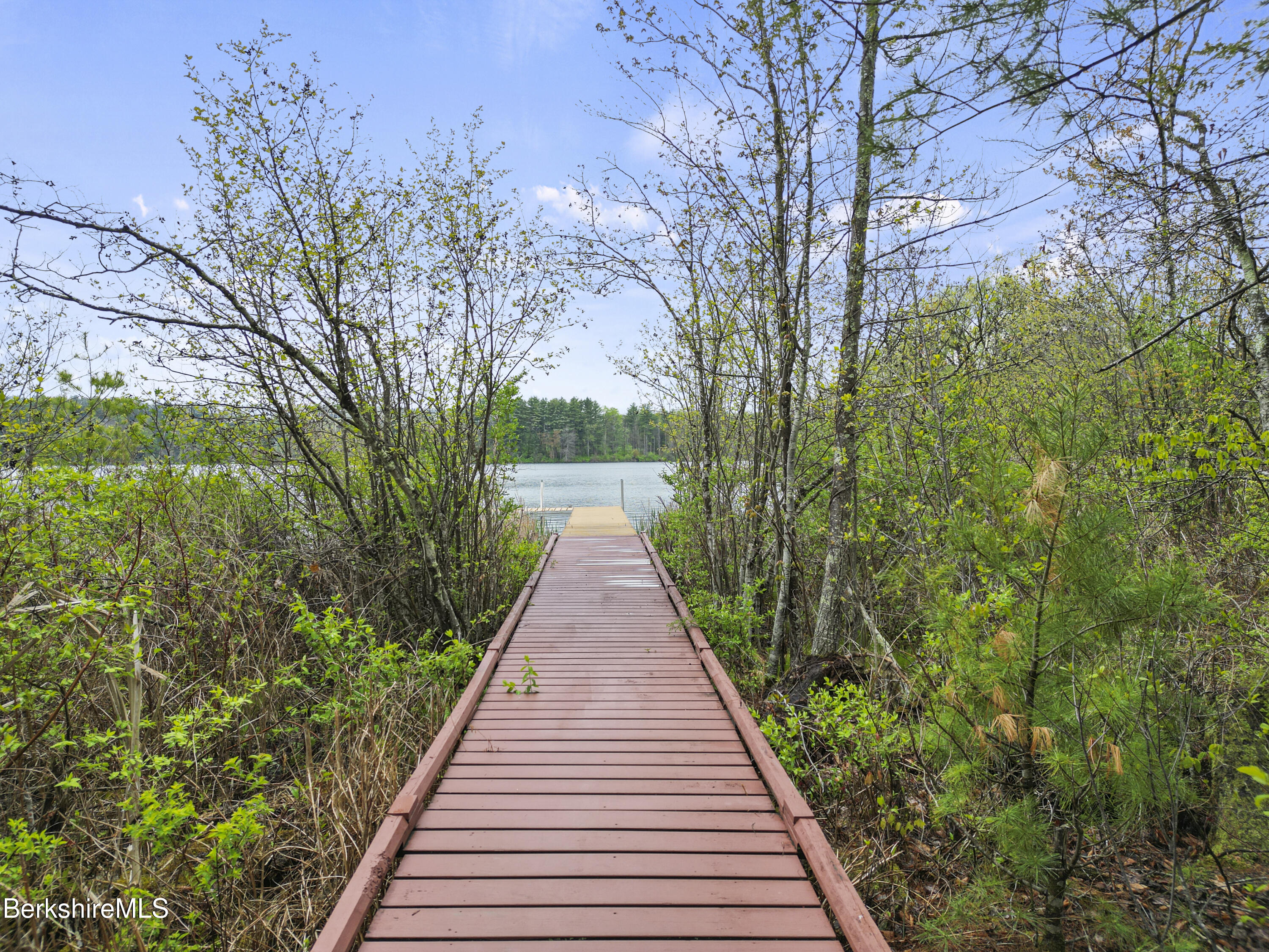 286 Lee Road Lenox, MA 01240 - Photo 19 of 26 a view of a pathway with a wrought fence