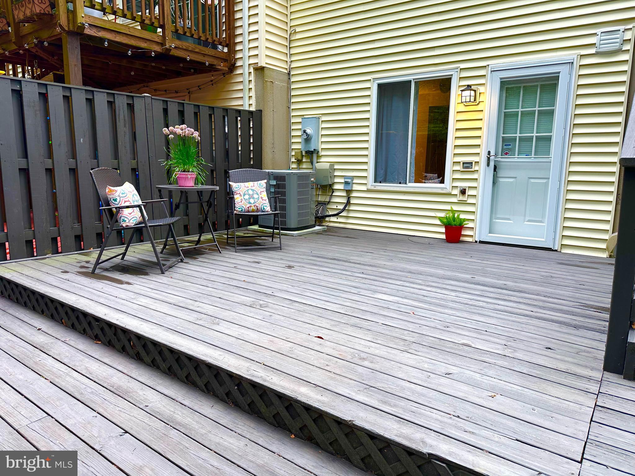 8301 Windfall Road Springfield, VA 22153 - Photo 14 of 27 a view of a wooden bench on the roof