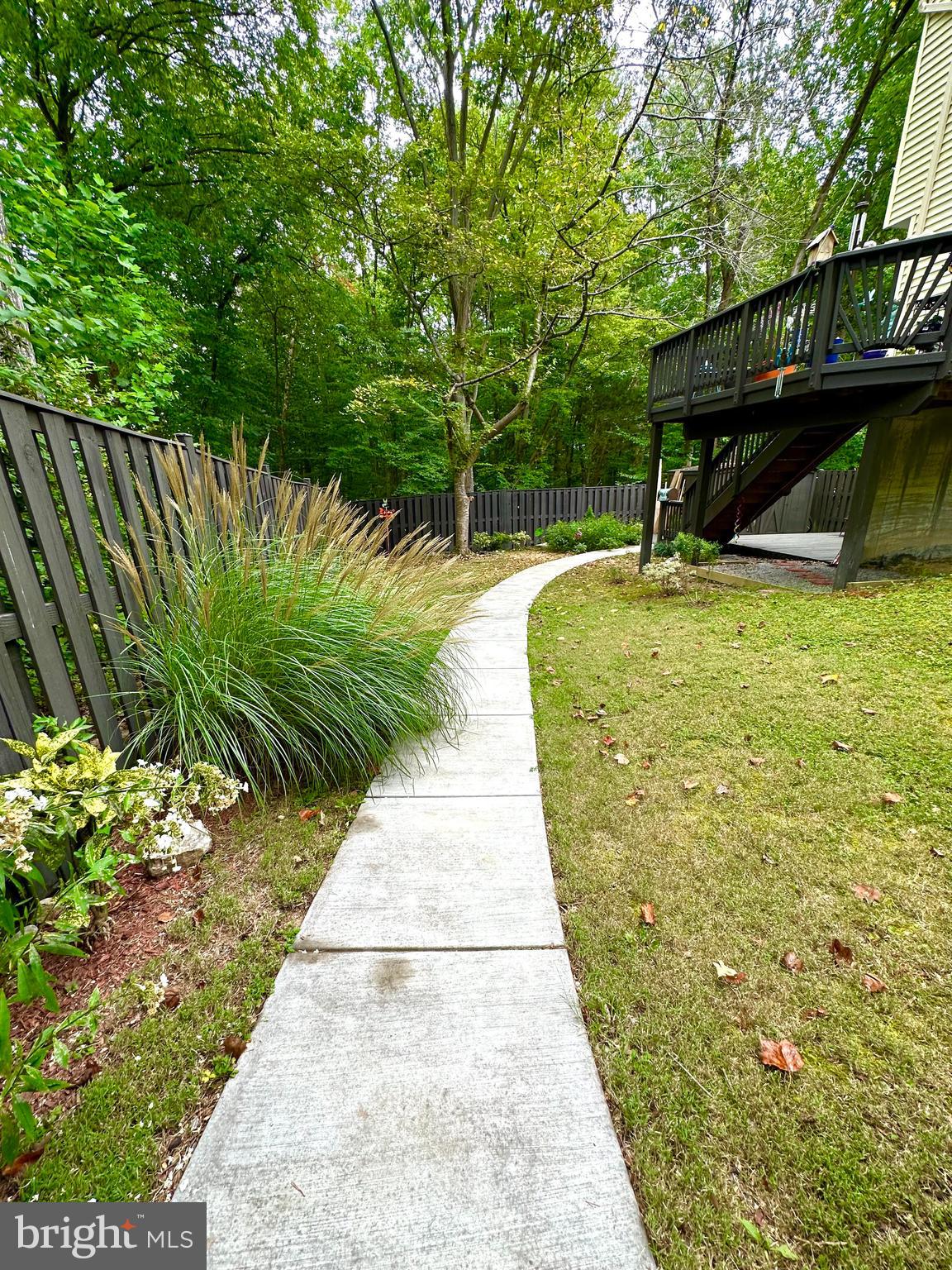 8301 Windfall Road Springfield, VA 22153 - Photo 18 of 27 a view of yard with wooden fence