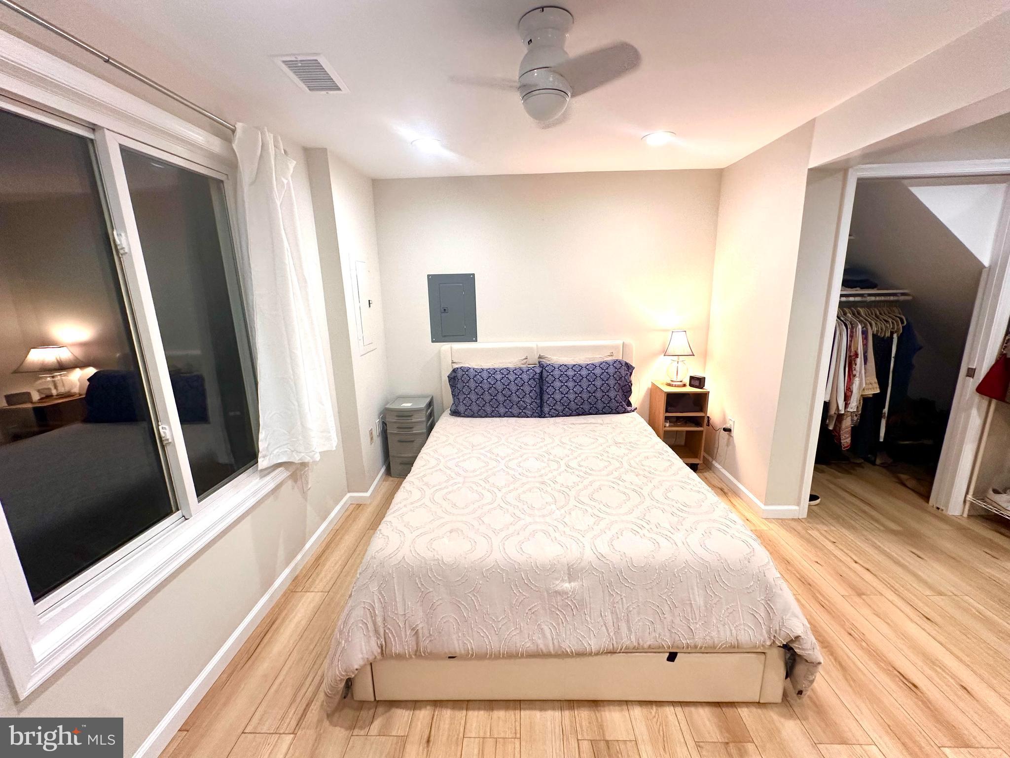 8301 Windfall Road Springfield, VA 22153 - Photo 23 of 27 a bedroom with a bed and a large mirror