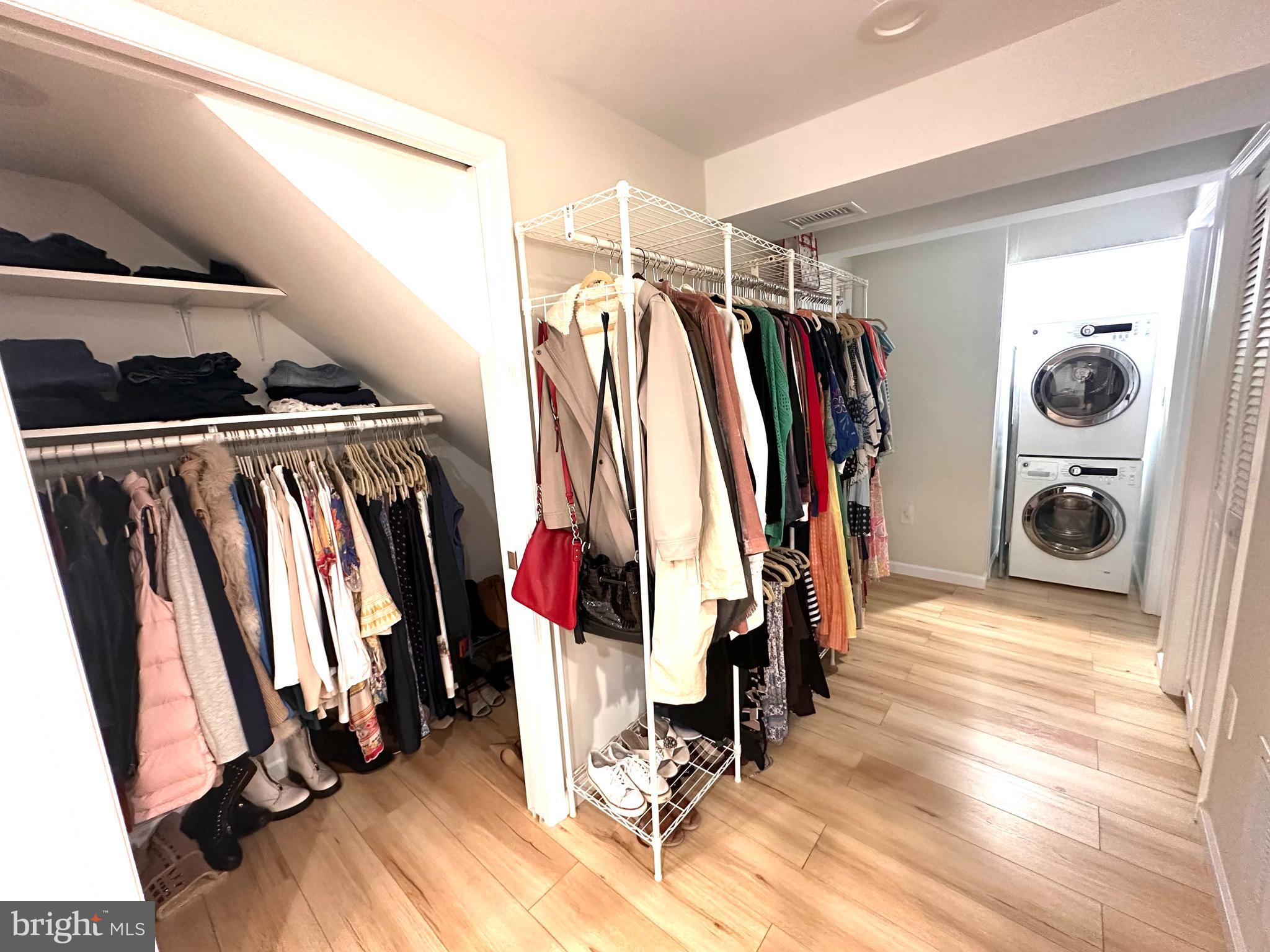 8301 Windfall Road Springfield, VA 22153 - Photo 26 of 27 a view of walk in closet with clothes and shoes
