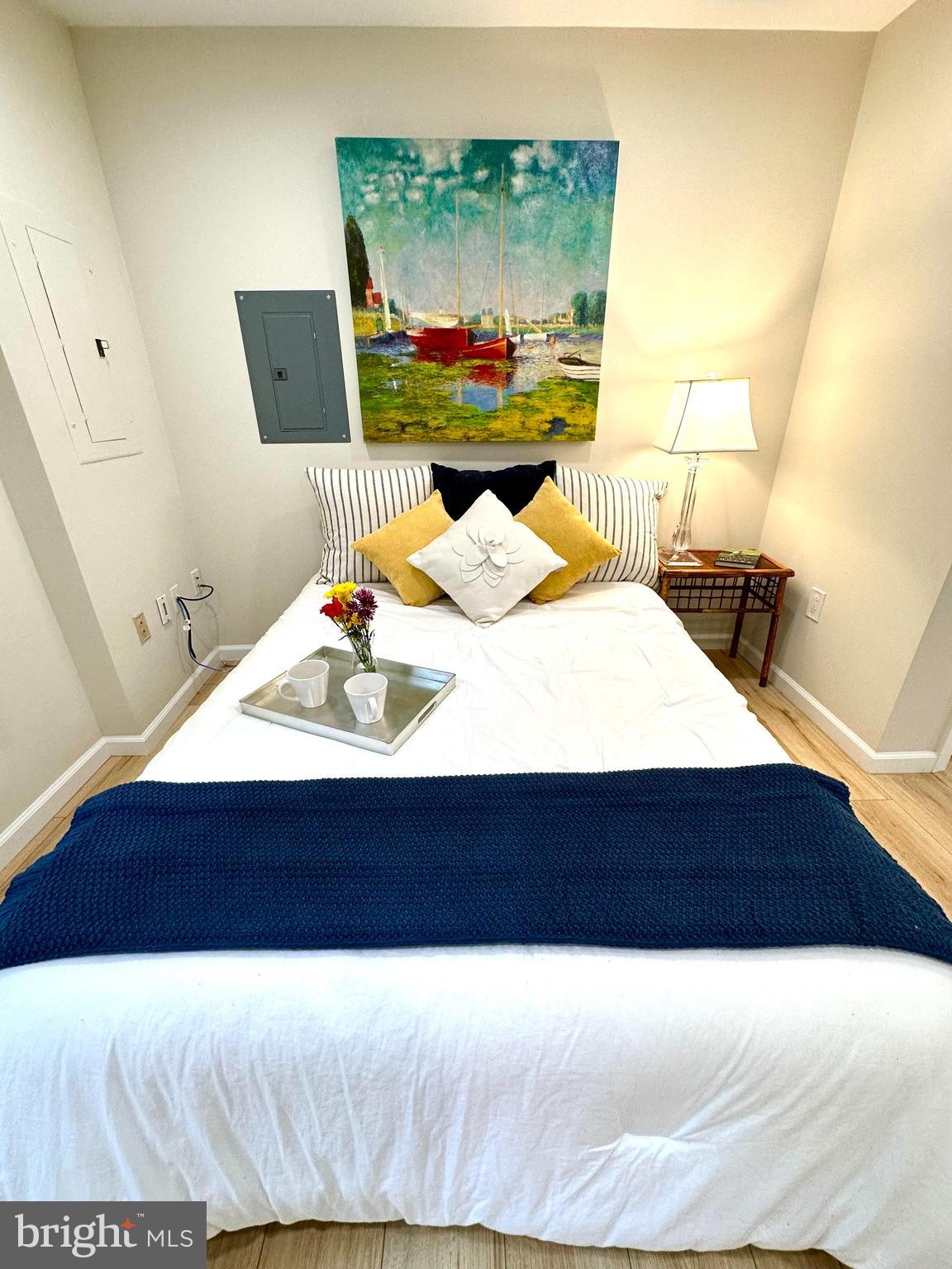 8301 Windfall Road Springfield, VA 22153 - Photo 3 of 27 a living room with a bed and a couch