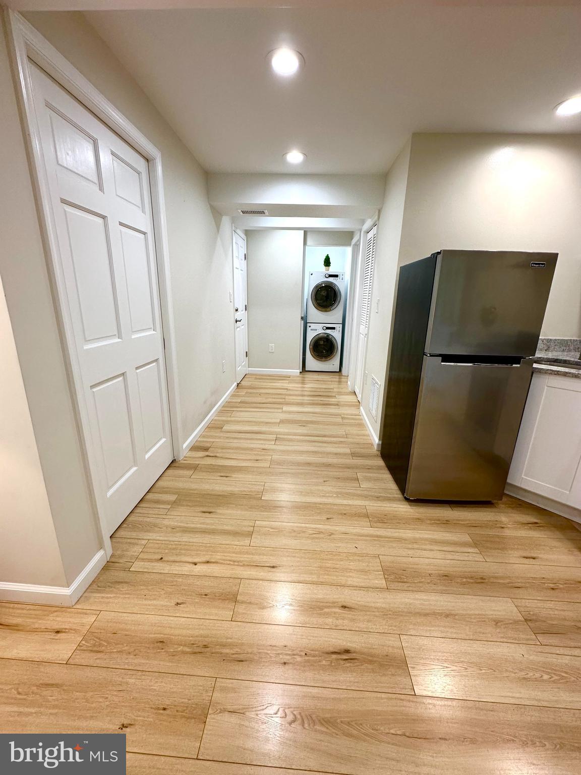 8301 Windfall Road Springfield, VA 22153 - Photo 4 of 27 a view of empty room with wooden floor