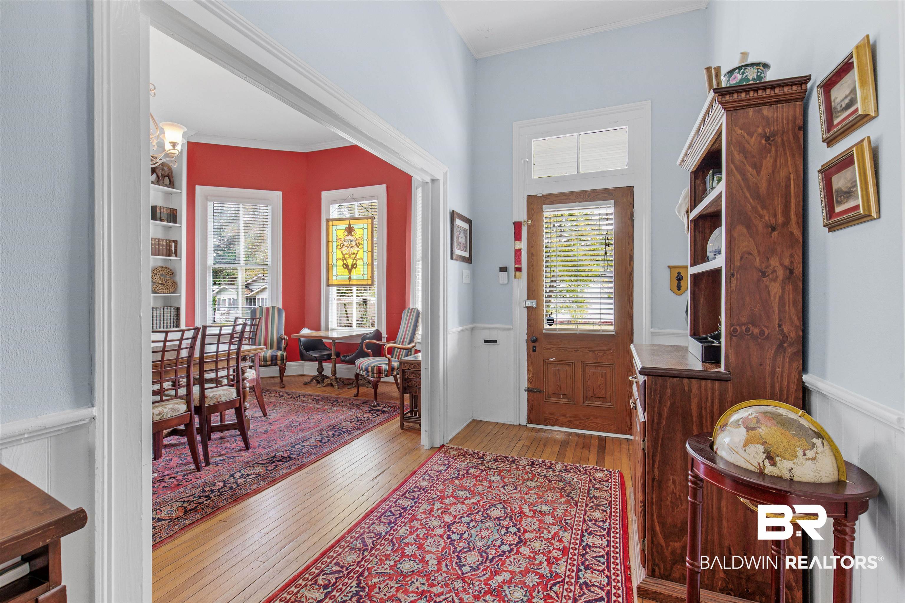 120 Espejo Street Mobile, AL 36604 - Photo 2 of 36 Entryway with light wood finished floors and crown molding