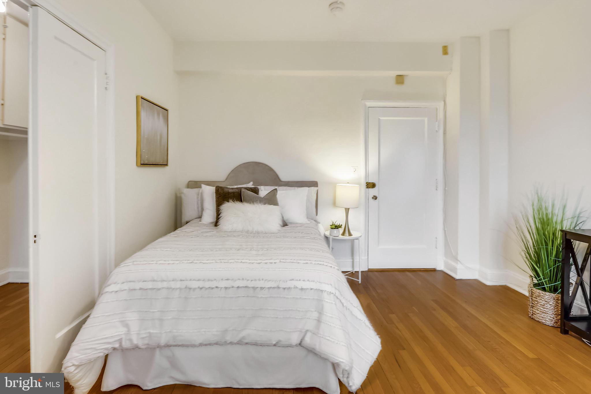 2032 Belmont Road Northwest, Unit 414 Washington, DC 20009 - Photo 11 of 31 Hardwood floors throughout unit
